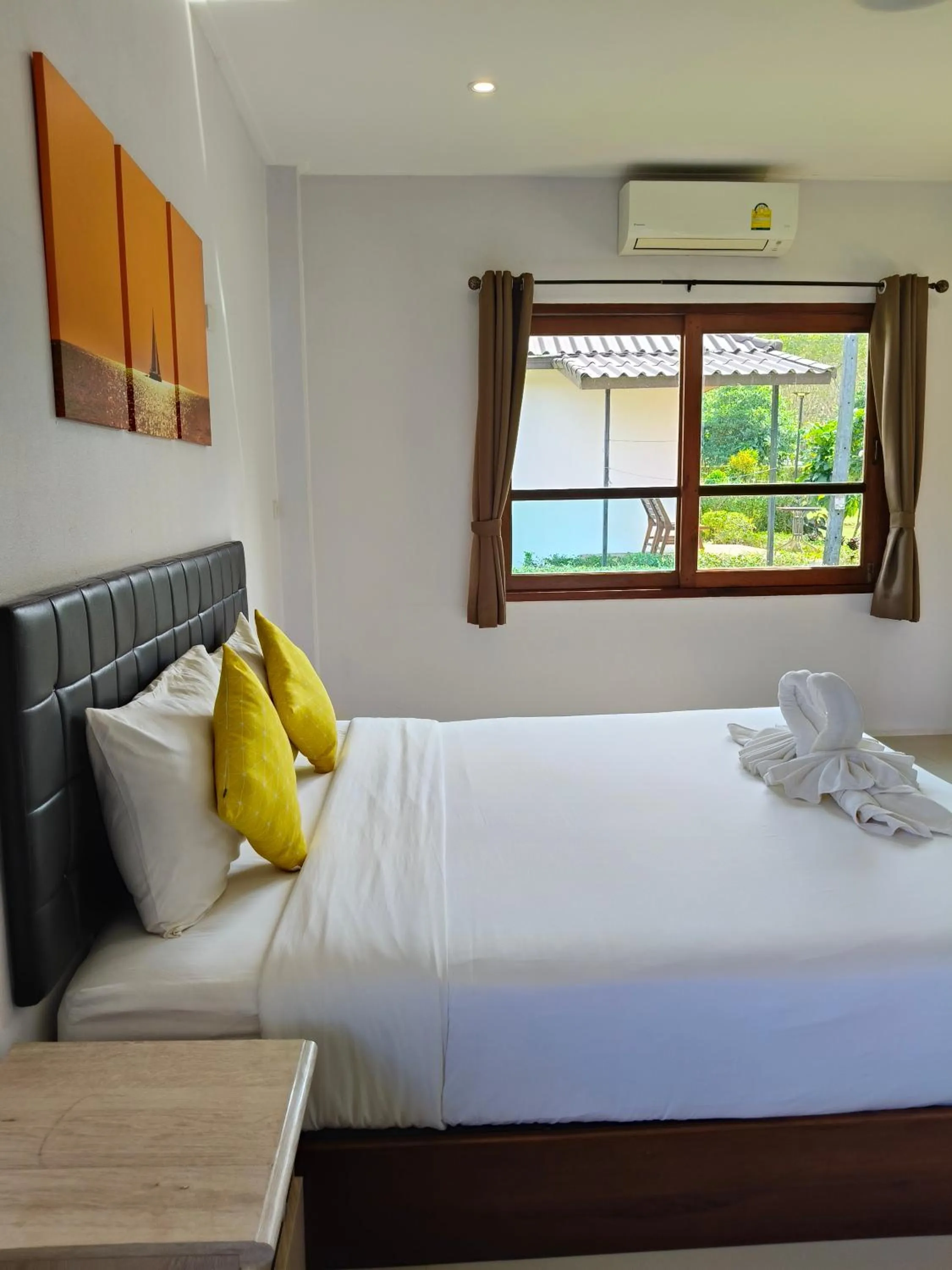 Bed in The Lodge at Koh Kood