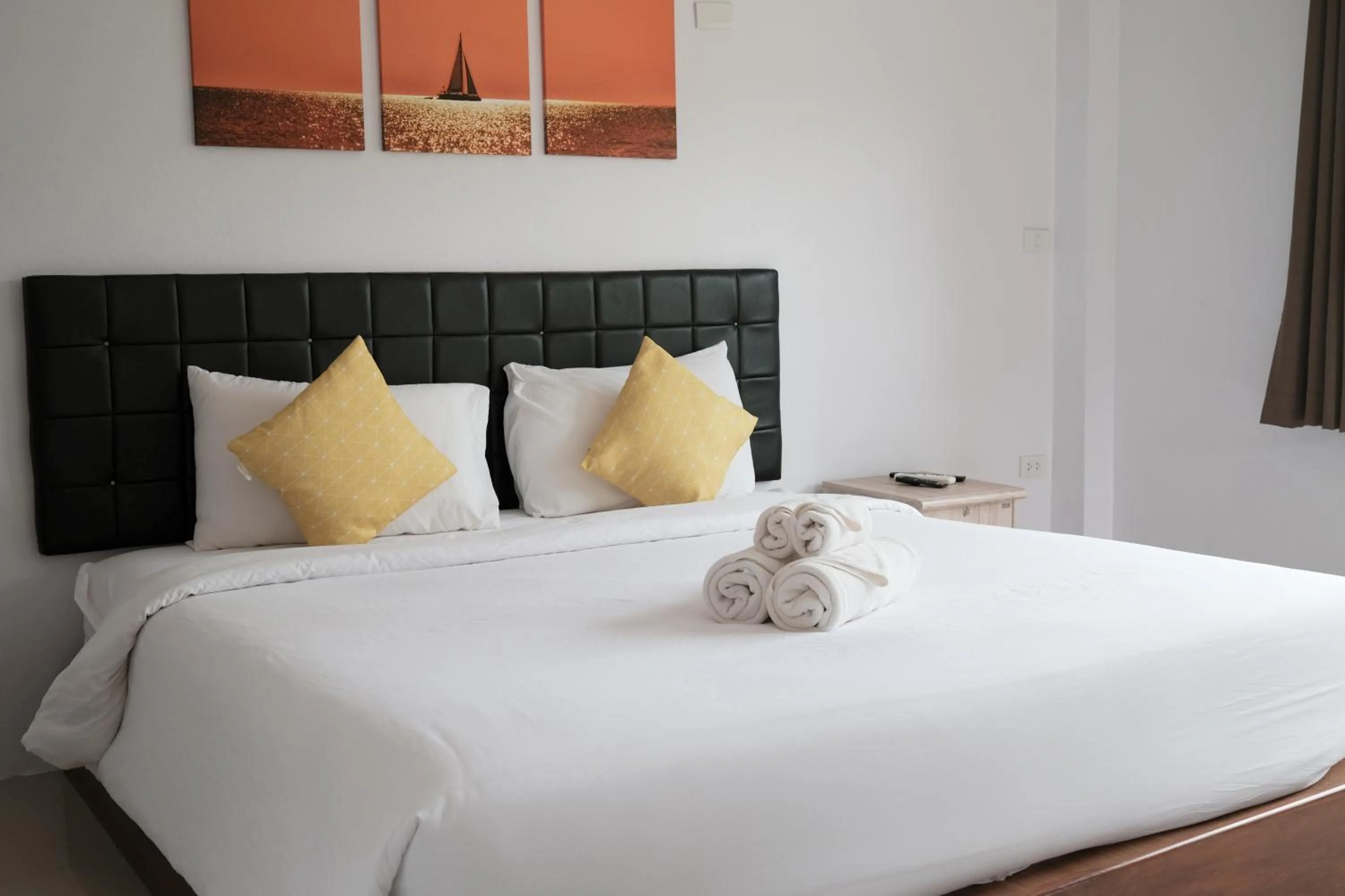 Bed in The Lodge at Koh Kood