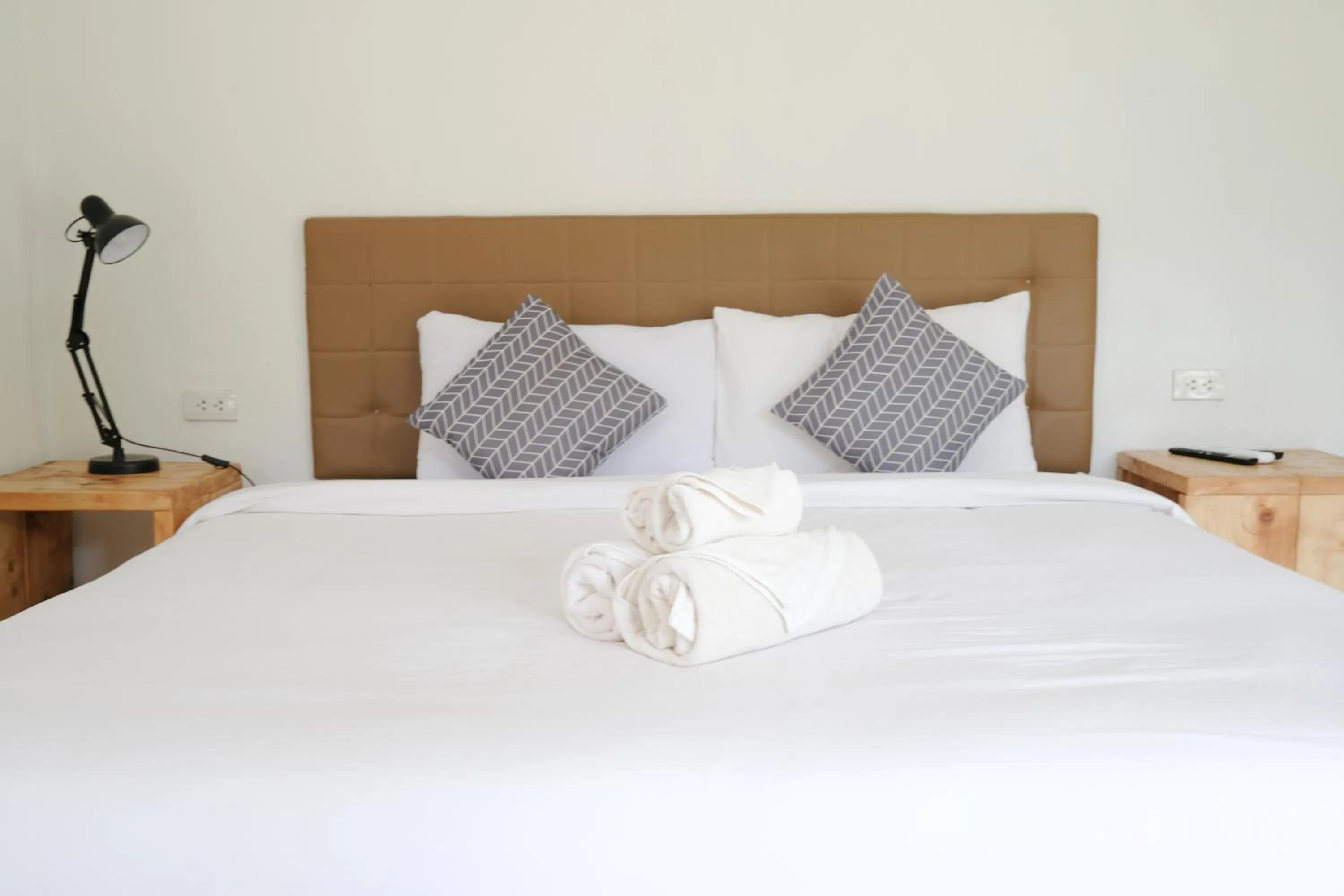 Bed in The Lodge at Koh Kood