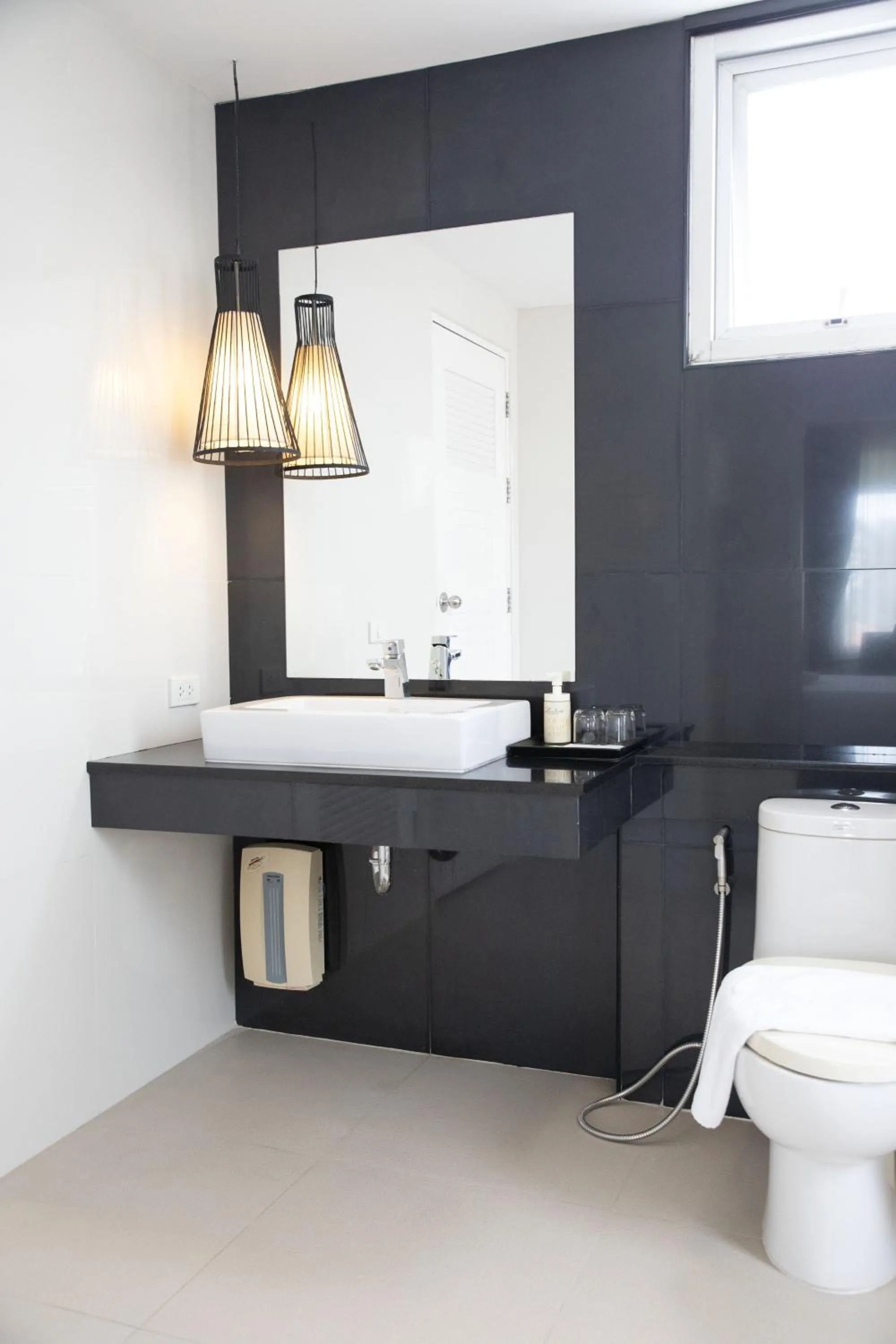 Toilet in The Leela Resort & Spa Pattaya