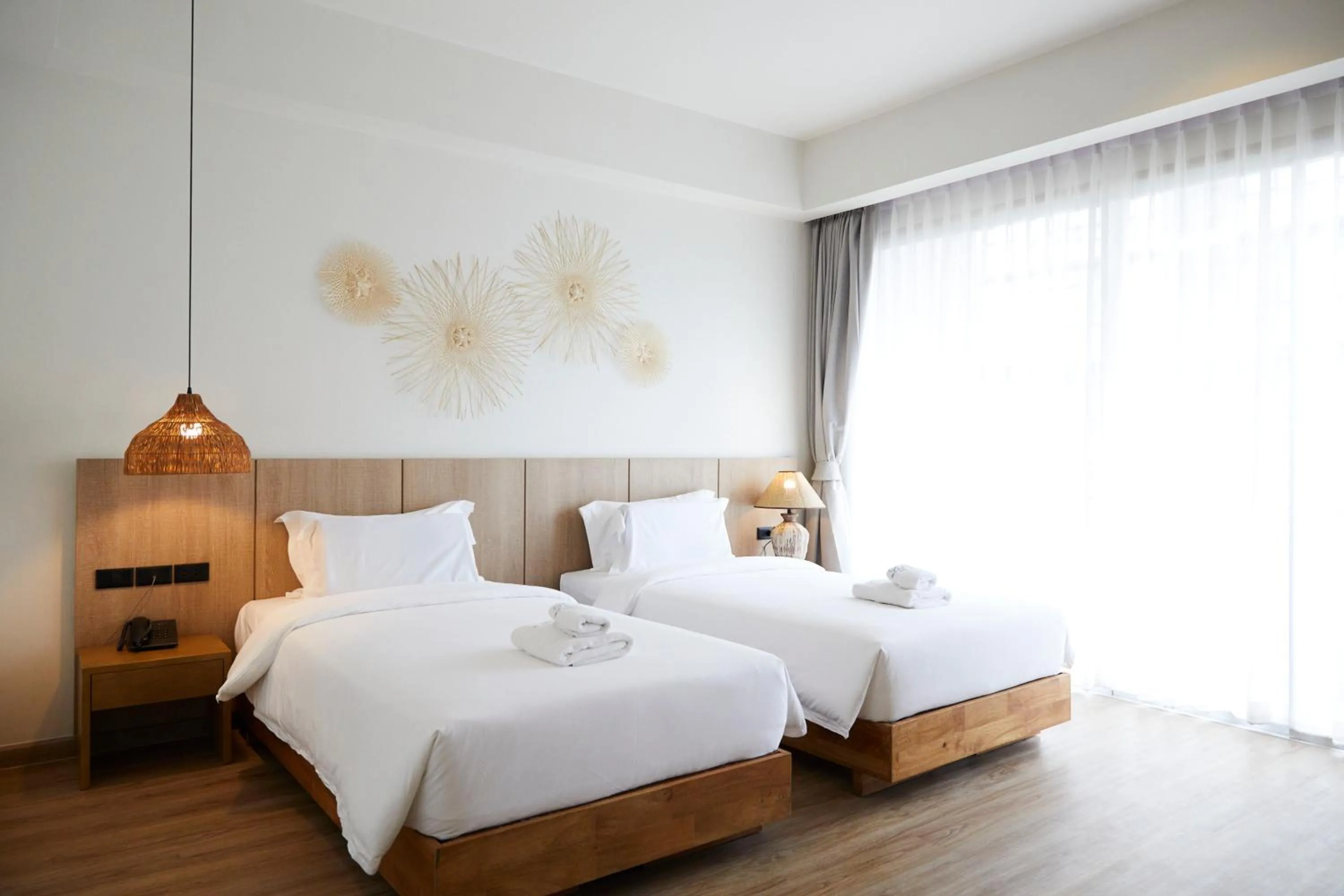 Bed in The Leela Resort & Spa Pattaya