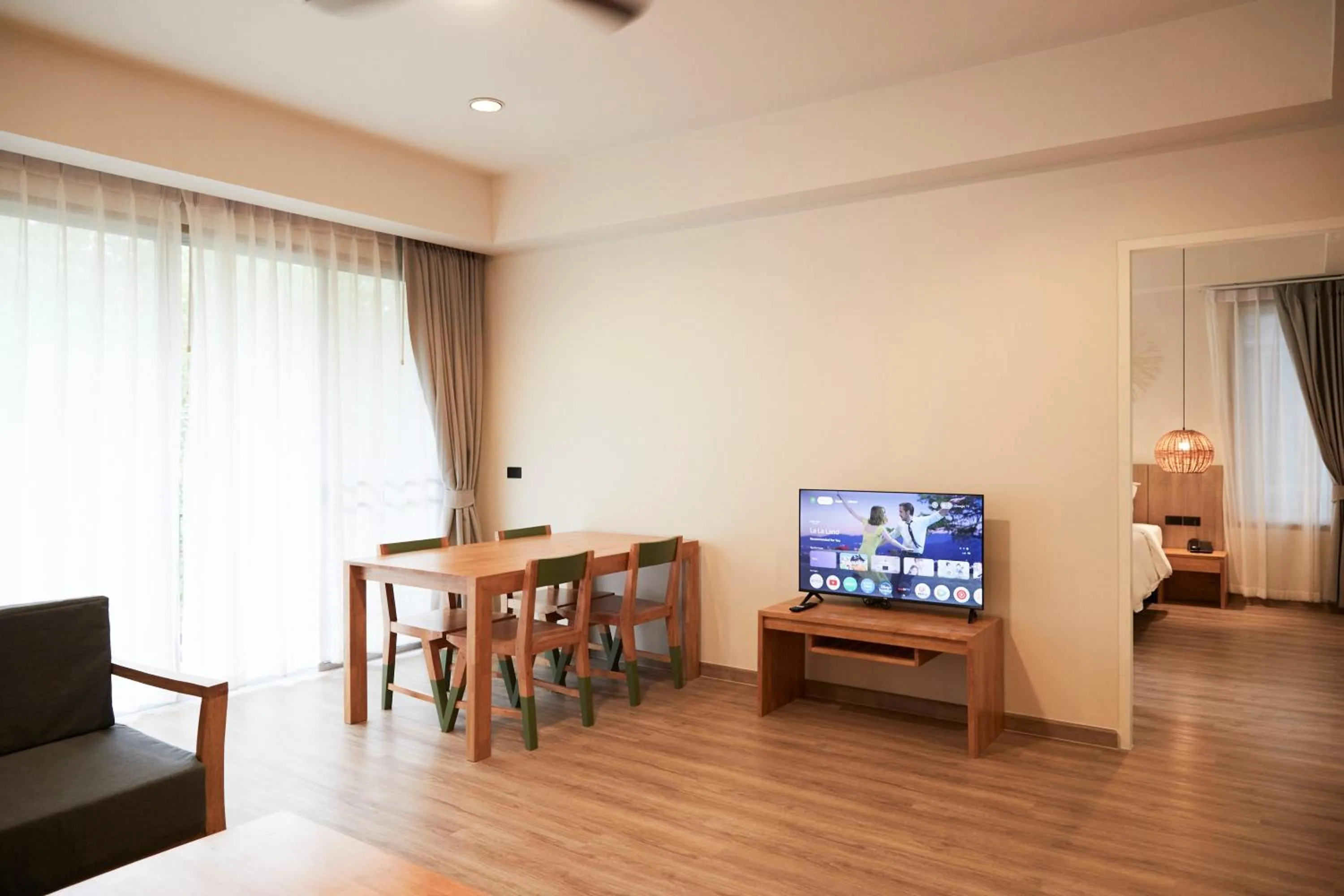 Communal lounge/ TV room in The Leela Resort & Spa Pattaya