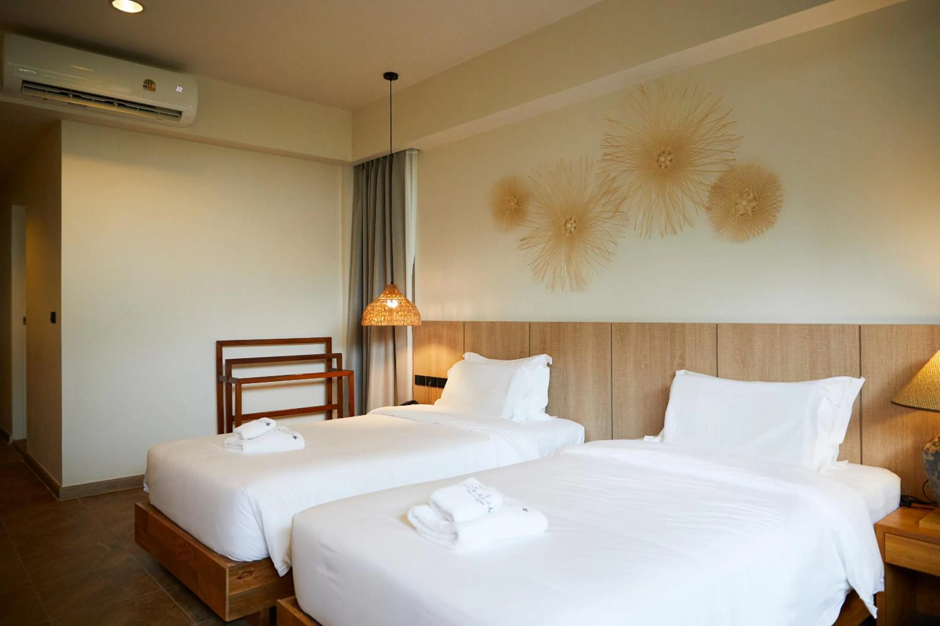 Bed in The Leela Resort & Spa Pattaya