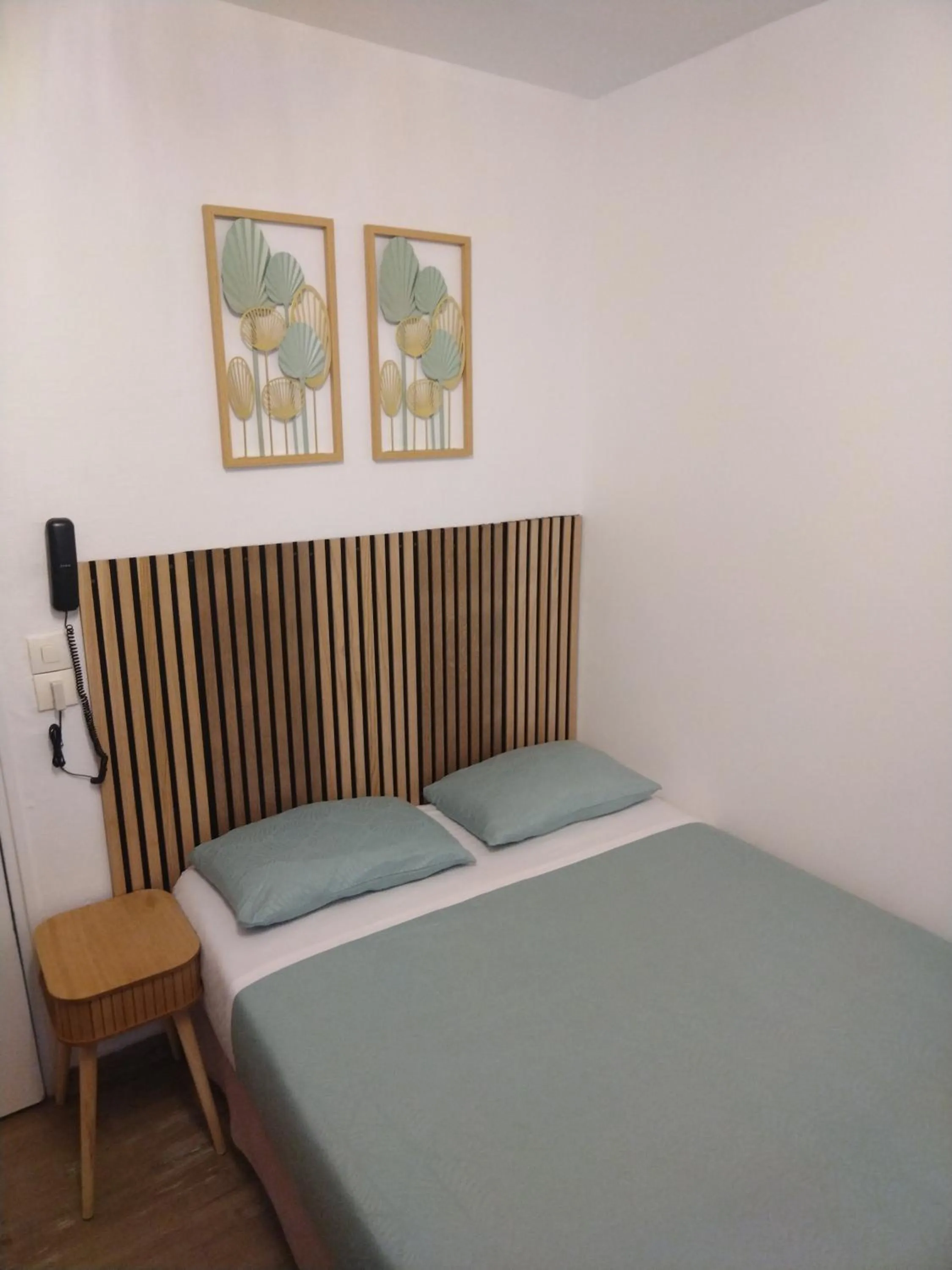 Bed in Hôtel de l'Europe