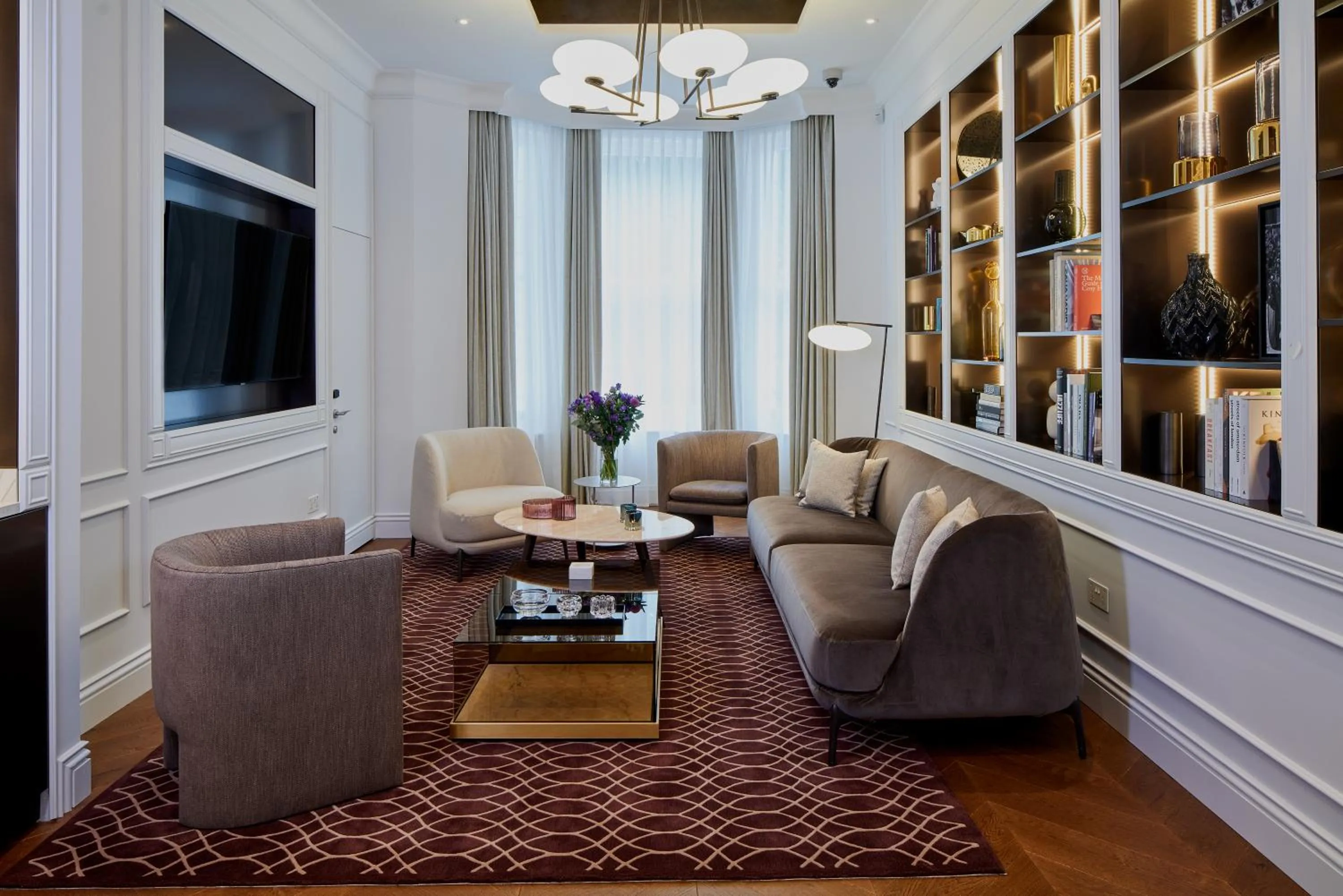 Communal lounge/ TV room in Lexham Gardens by Cheval Maison