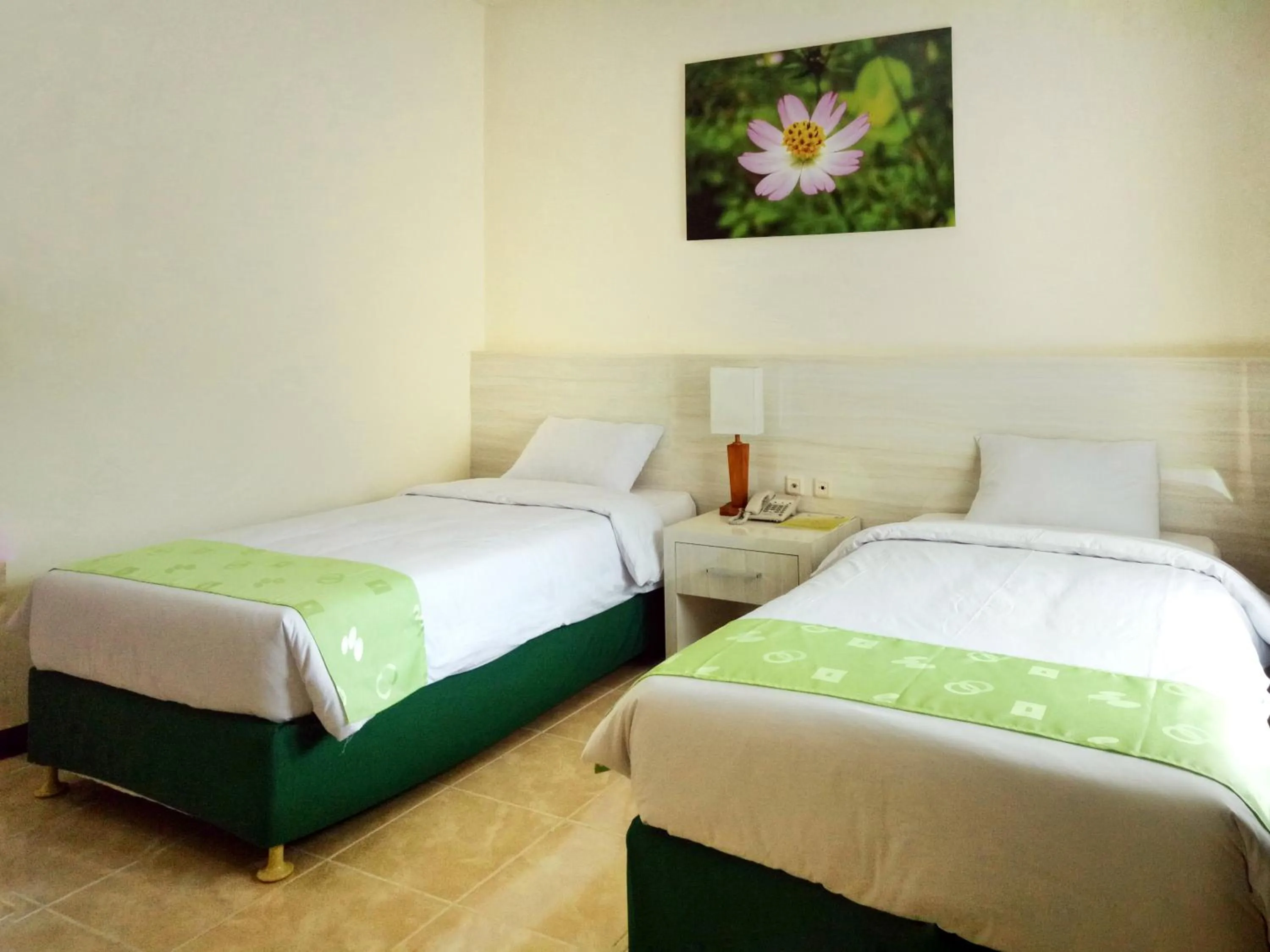 Bed in Green Garden Hotel