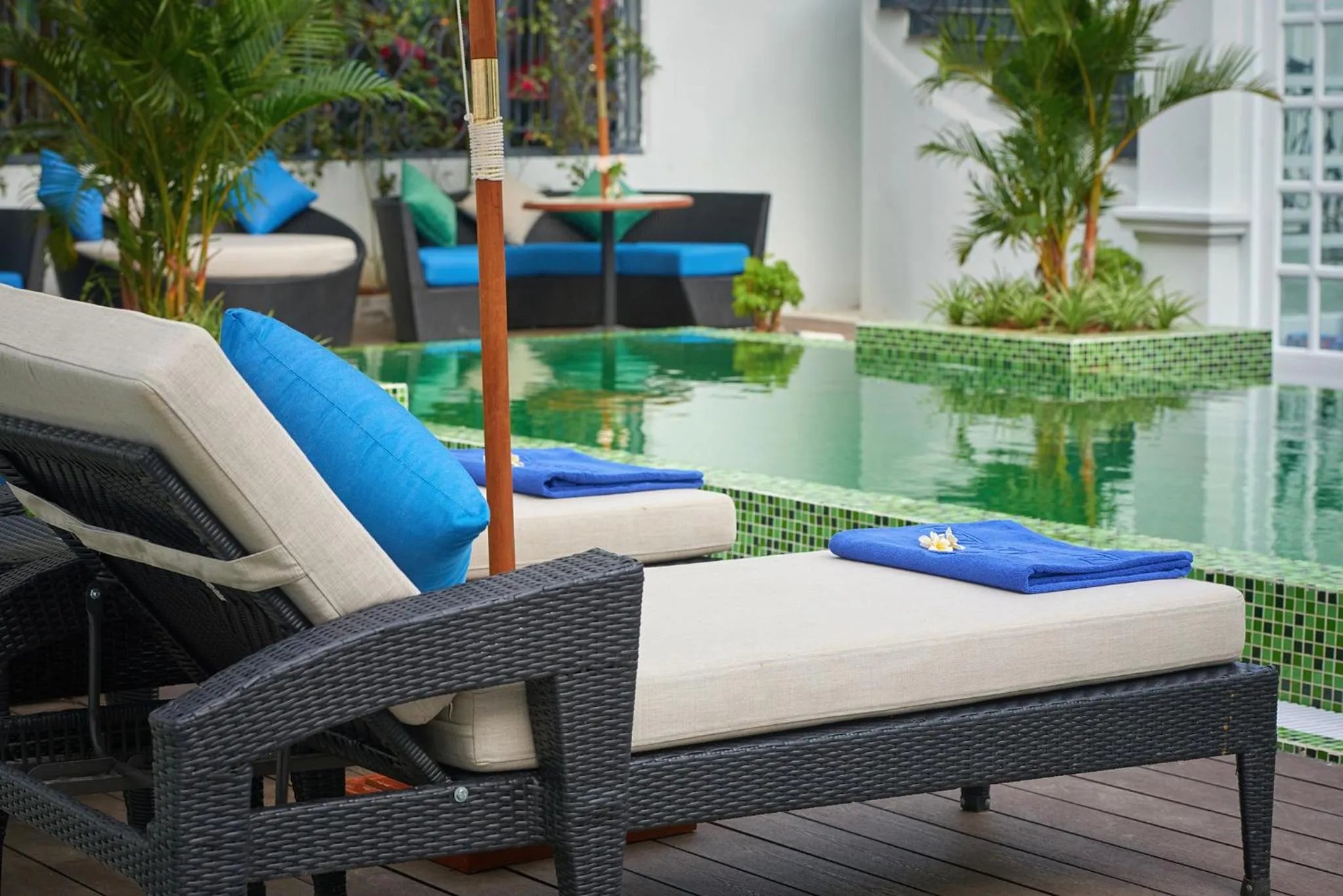 Swimming pool in Manoir Des Arts Hotel