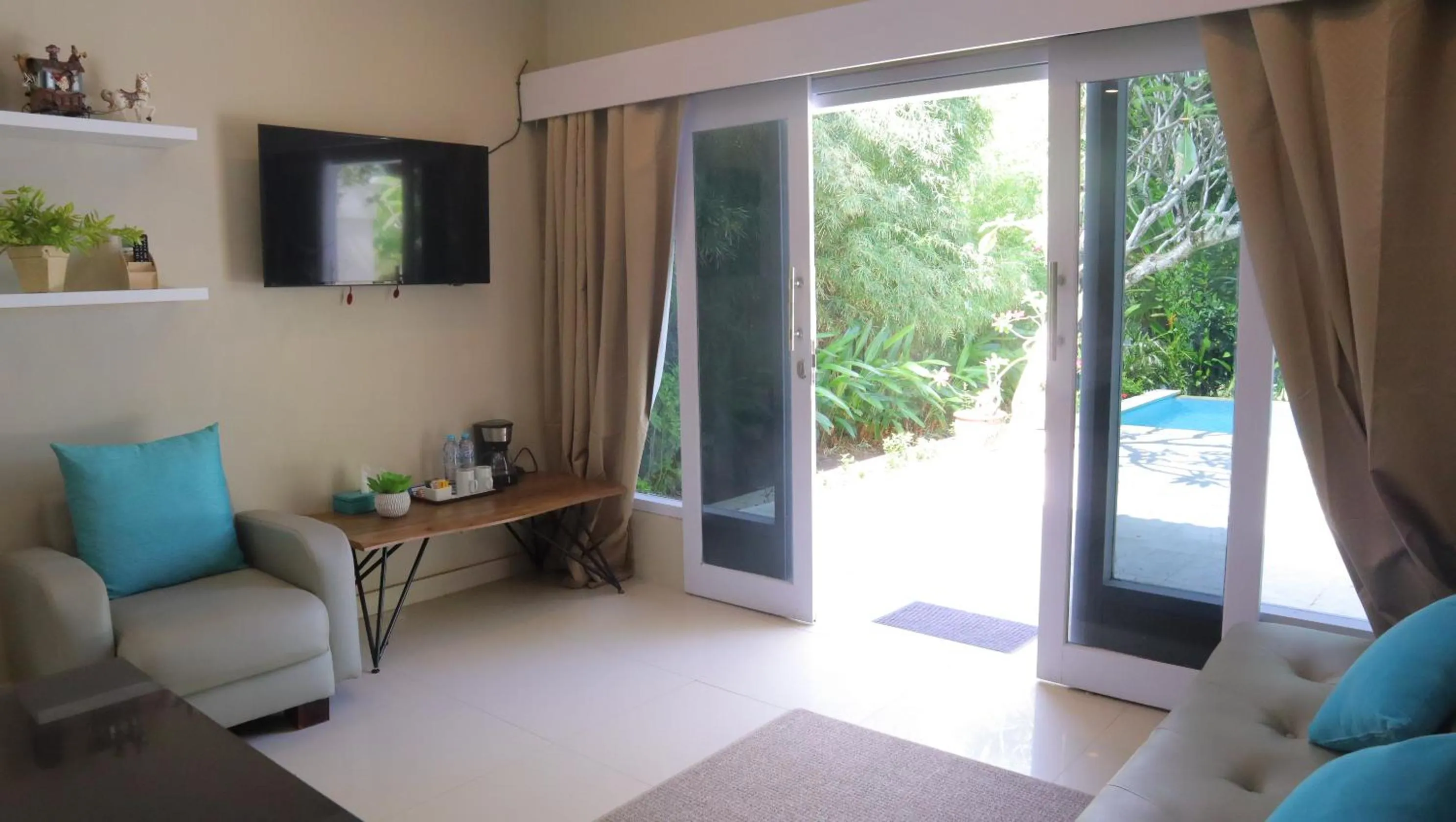 Communal lounge/ TV room in The Forty Eight Resort Candidasa