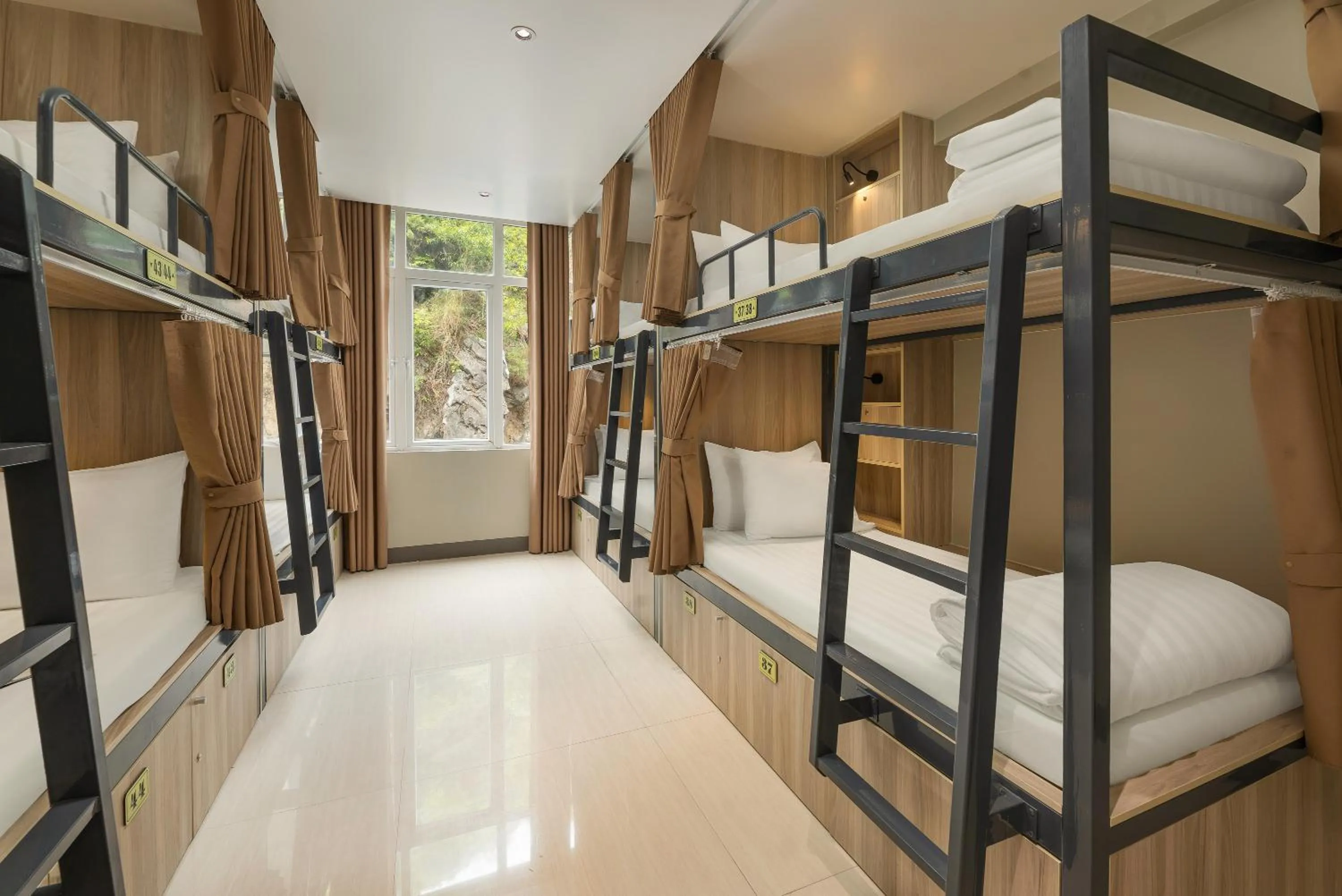 Property building, Bed in The Oversleep Catba Hostel & Pool Bar