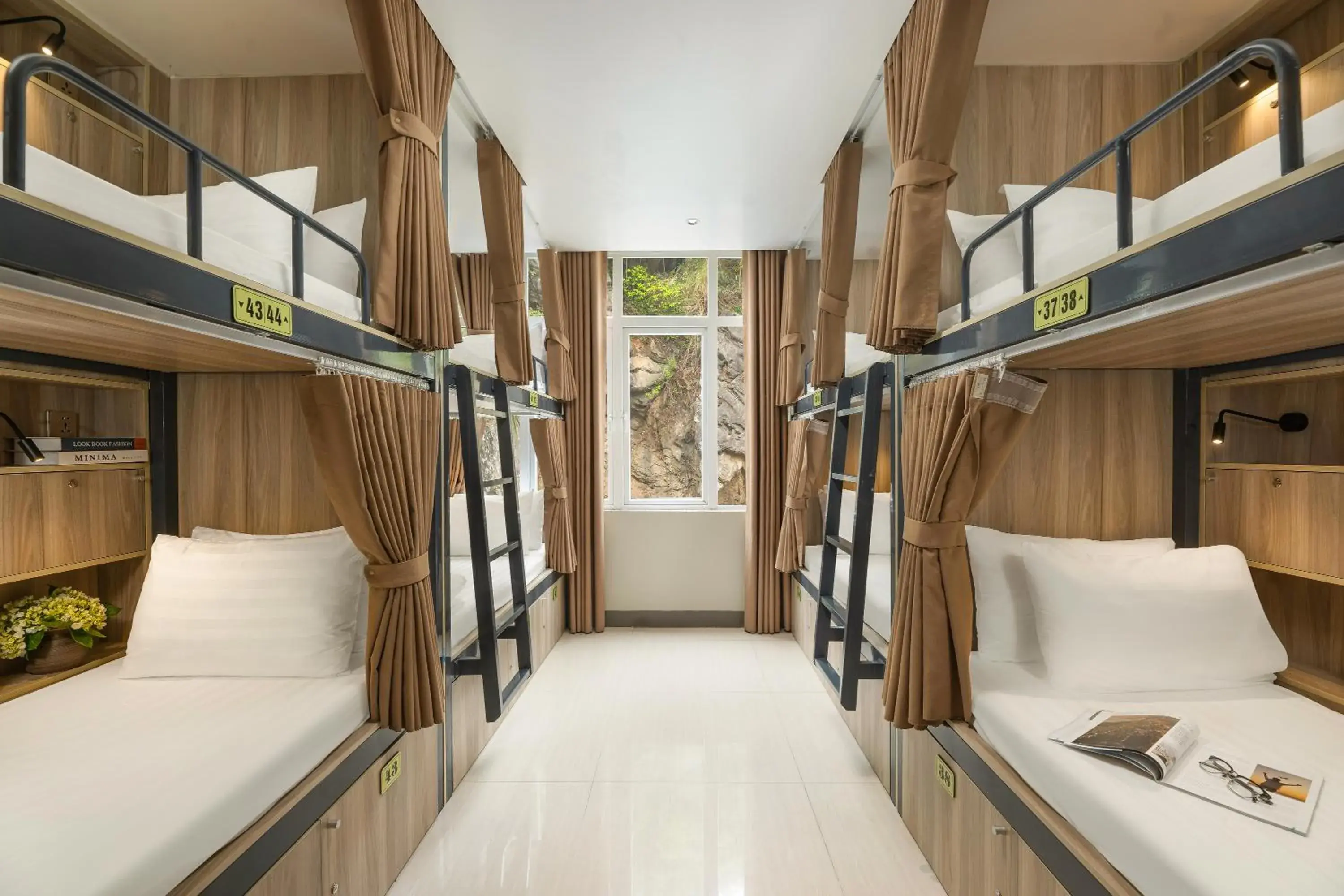 Bed in Female 8-Bed Dormitory Room in The Oversleep Catba Hostel & Pool Bar Bed in Female 8-Bed Dormitory Room in The Oversleep Catba Hostel & Pool Bar