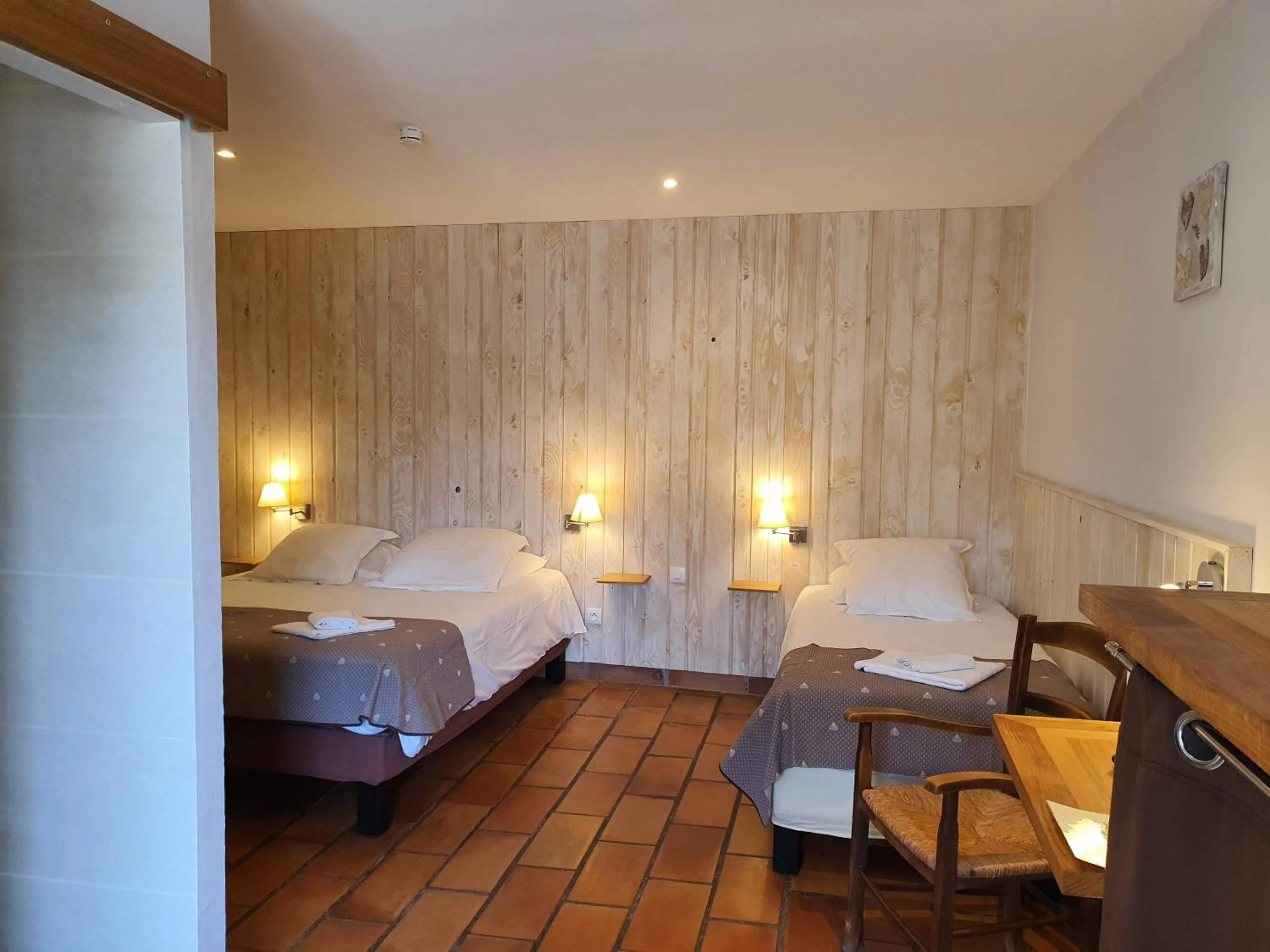 Bed in Logis Hôtel Restaurant L'Escarbille