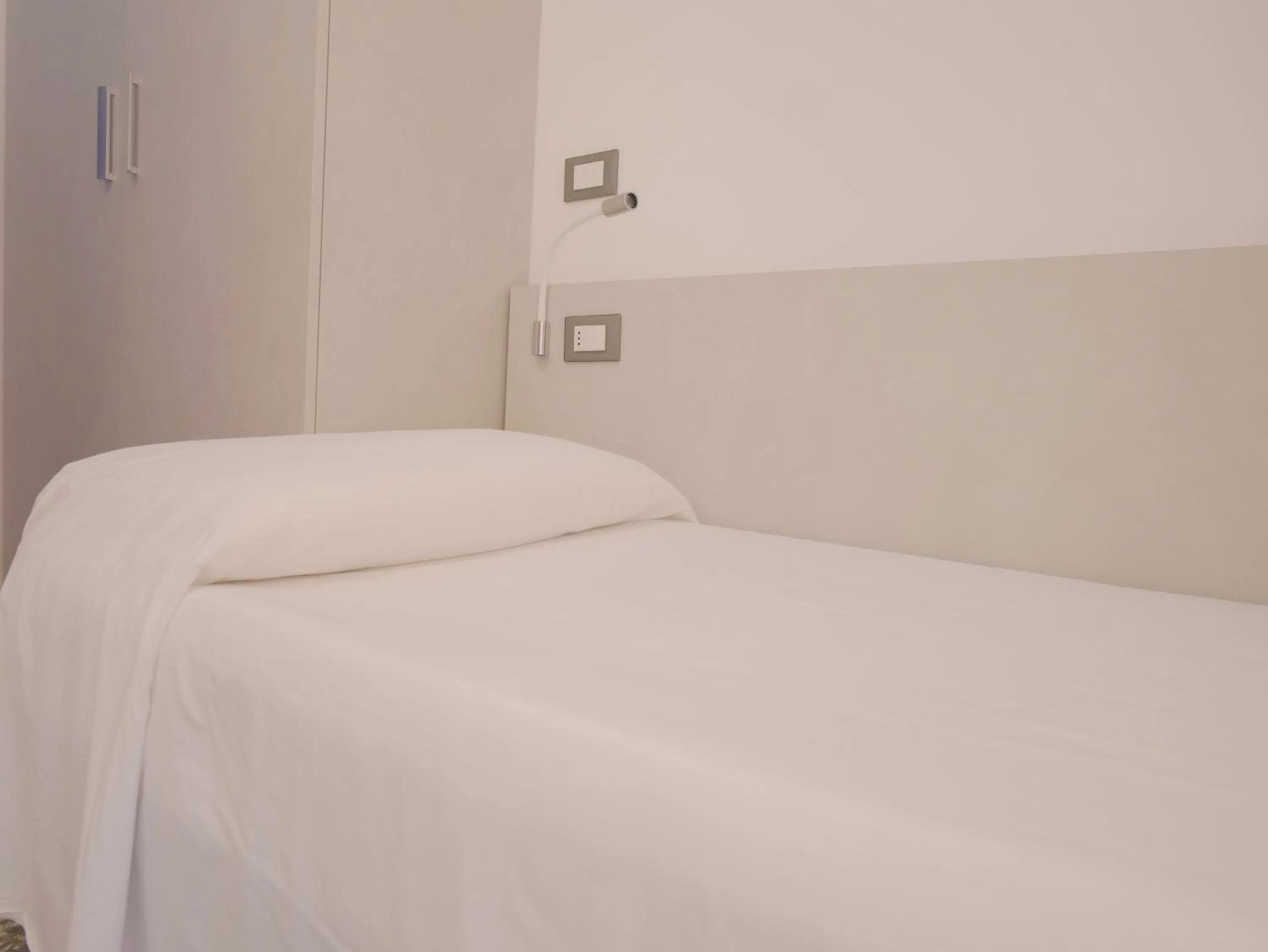 Bed in Hotel Liliana