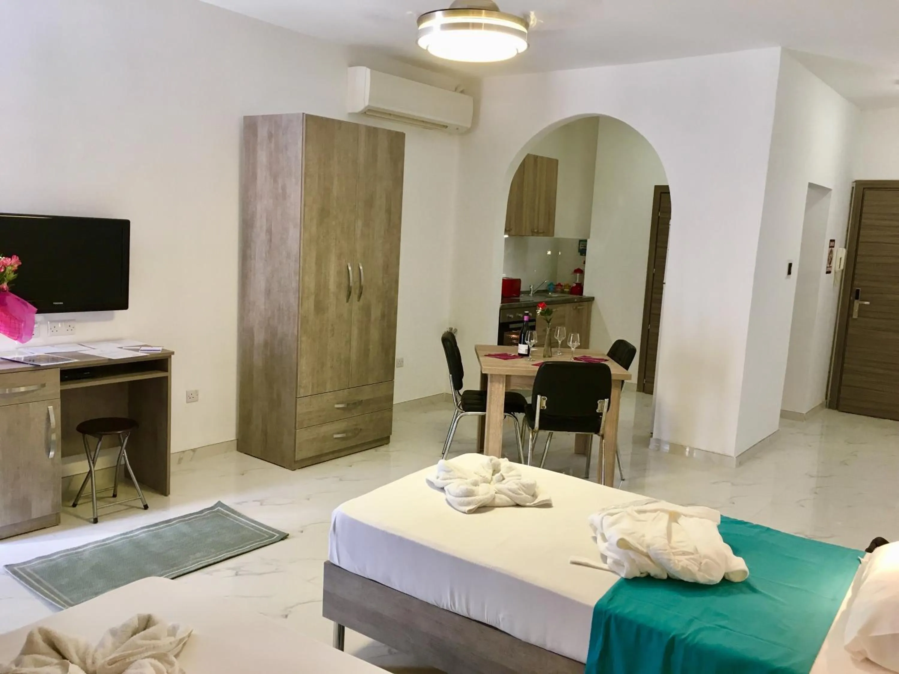 Bed in For Rest Aparthotel