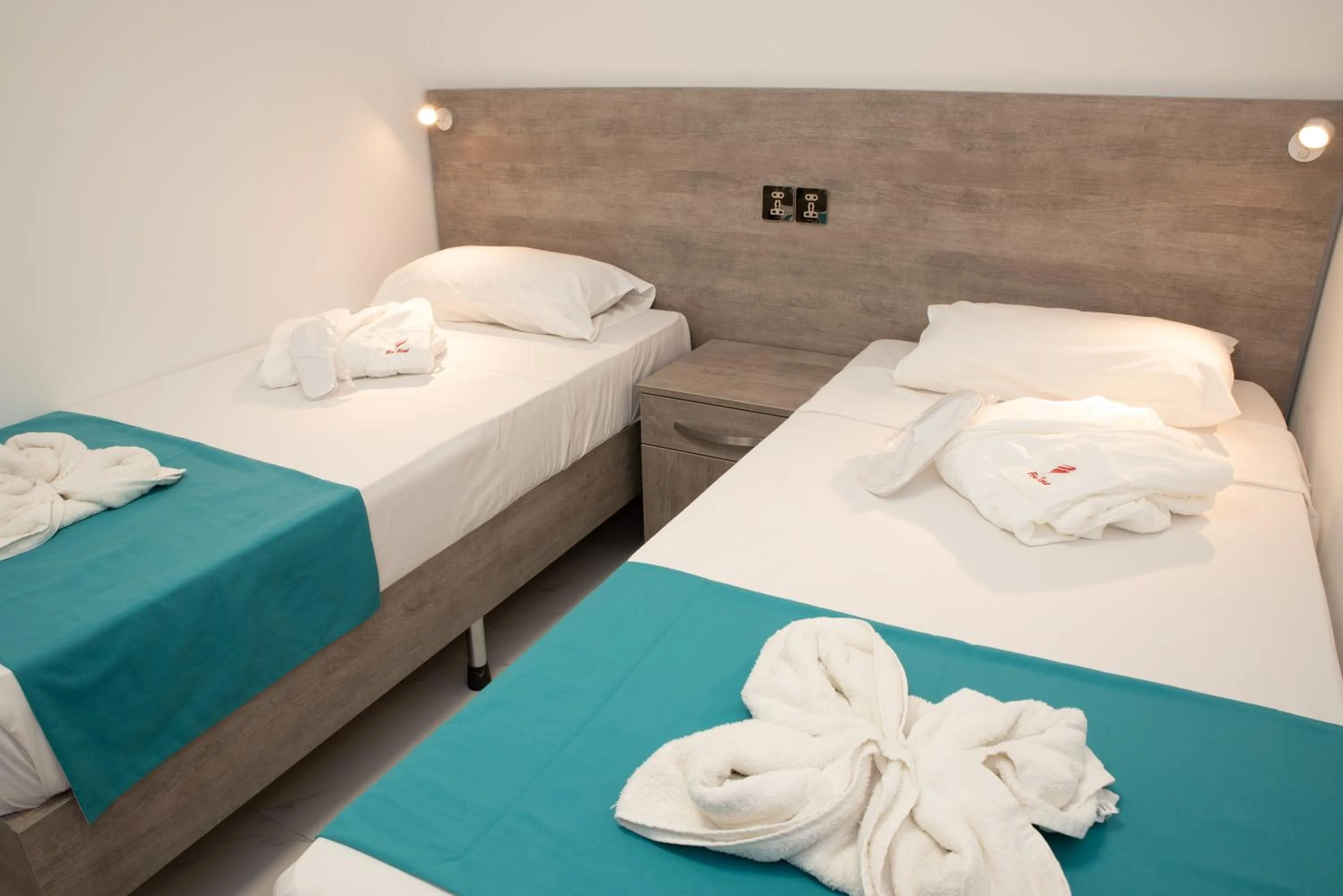 Bed in For Rest Aparthotel