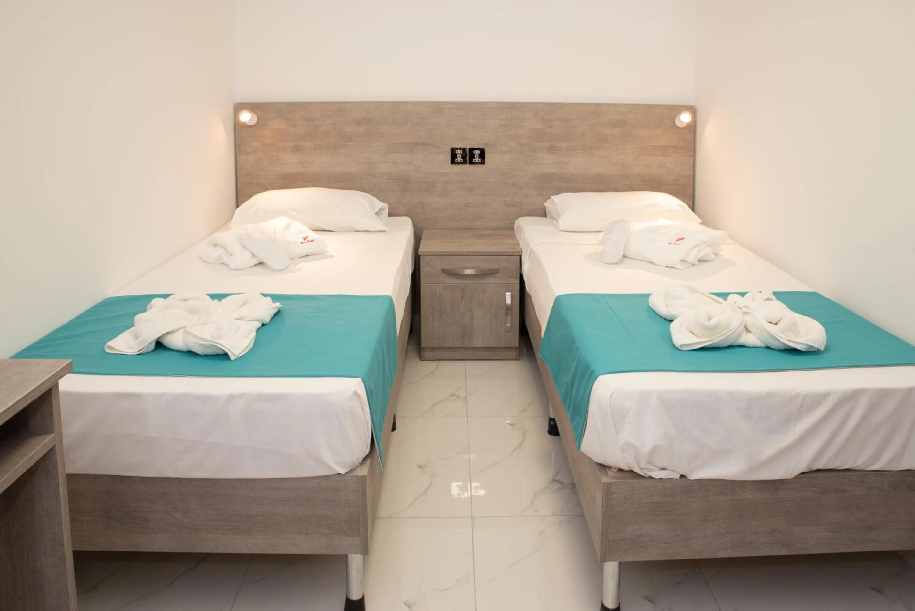 Bed in For Rest Aparthotel