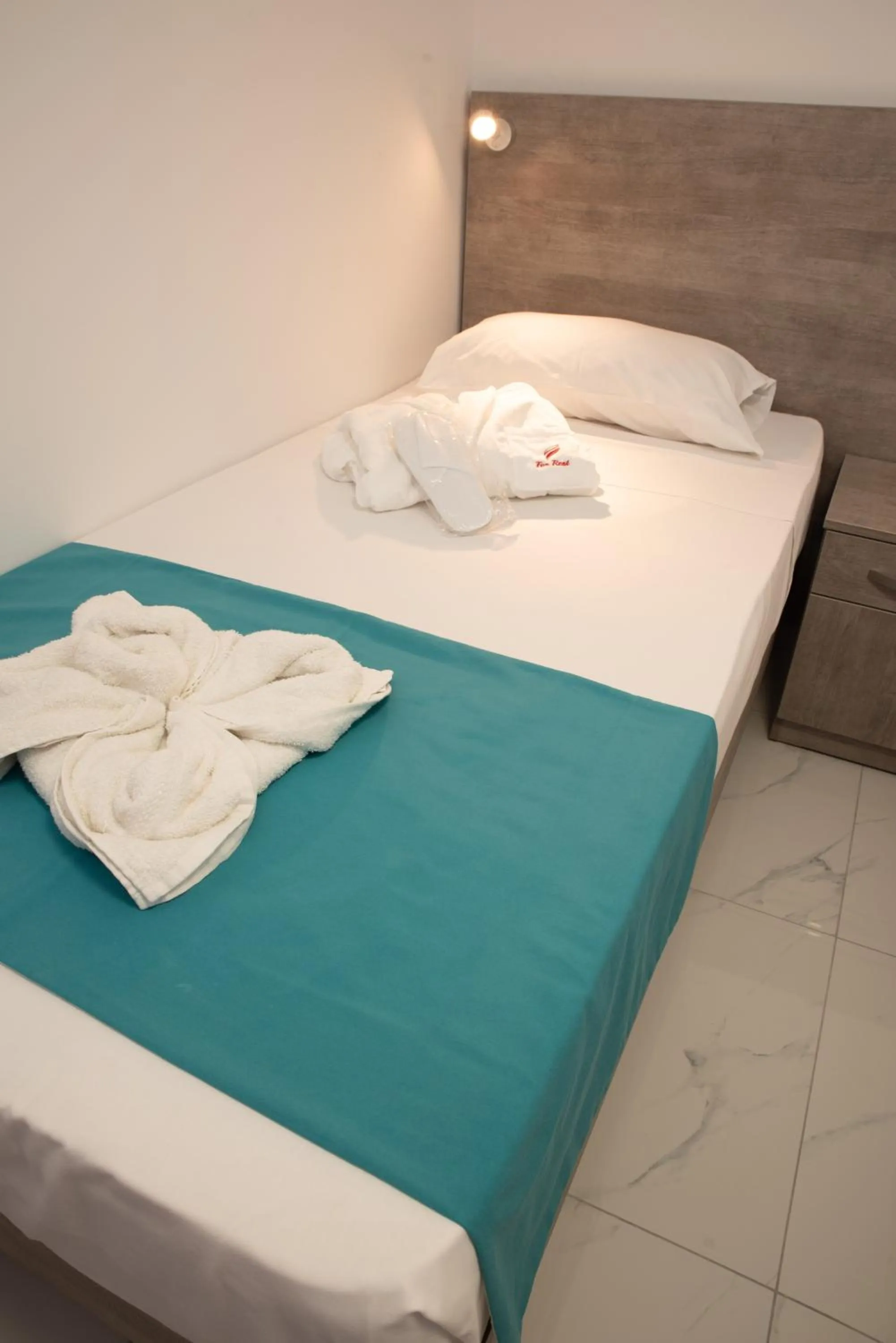 Bed in For Rest Aparthotel