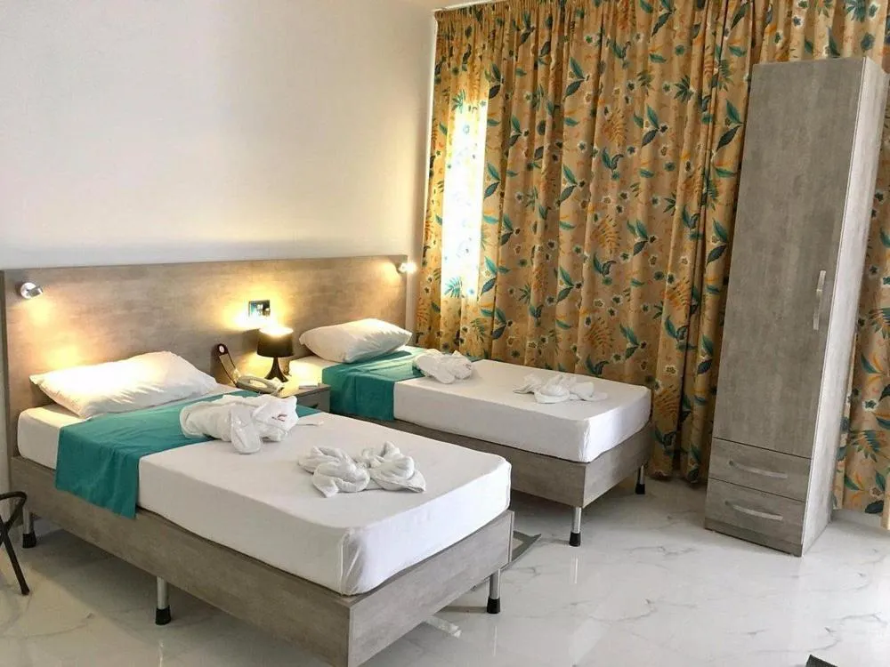 Bed in For Rest Aparthotel