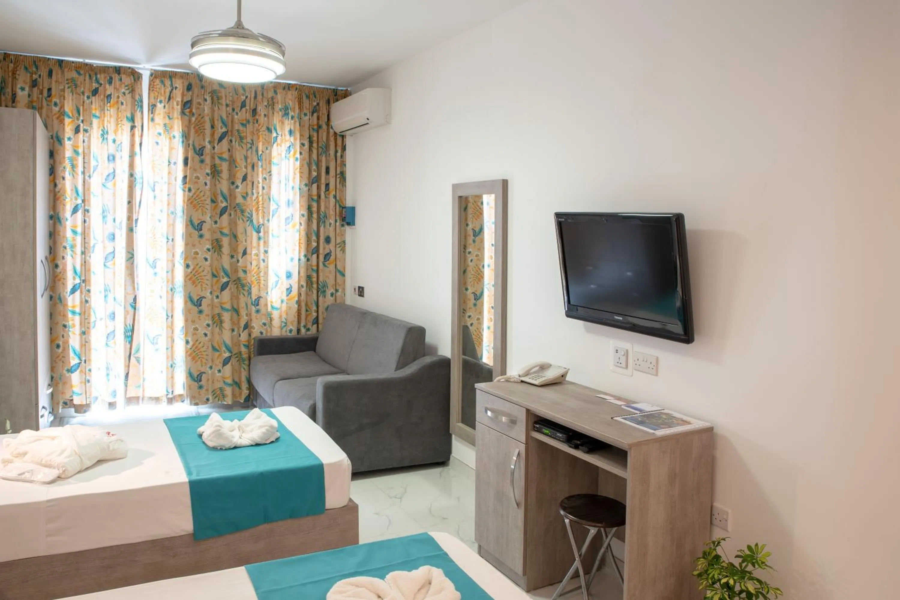 Bed in For Rest Aparthotel