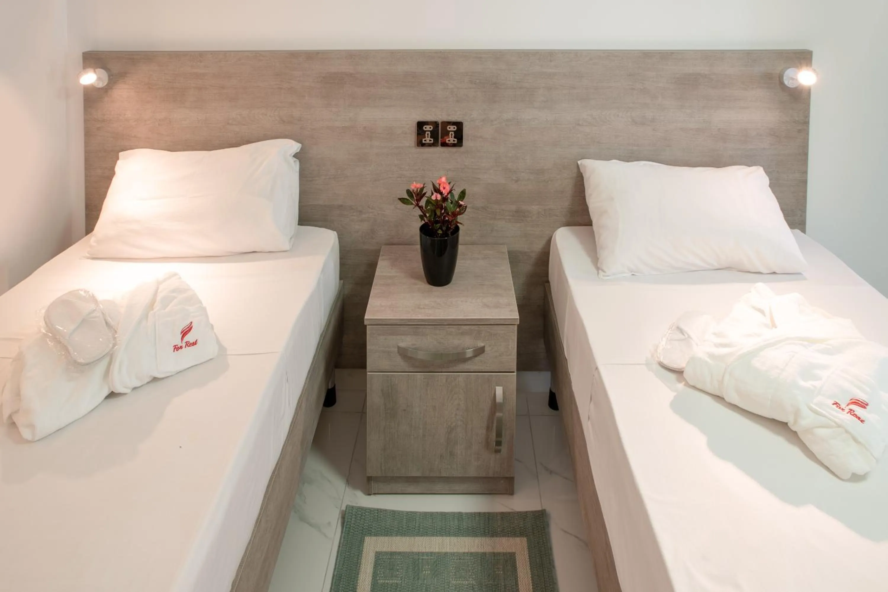 Bed in For Rest Aparthotel