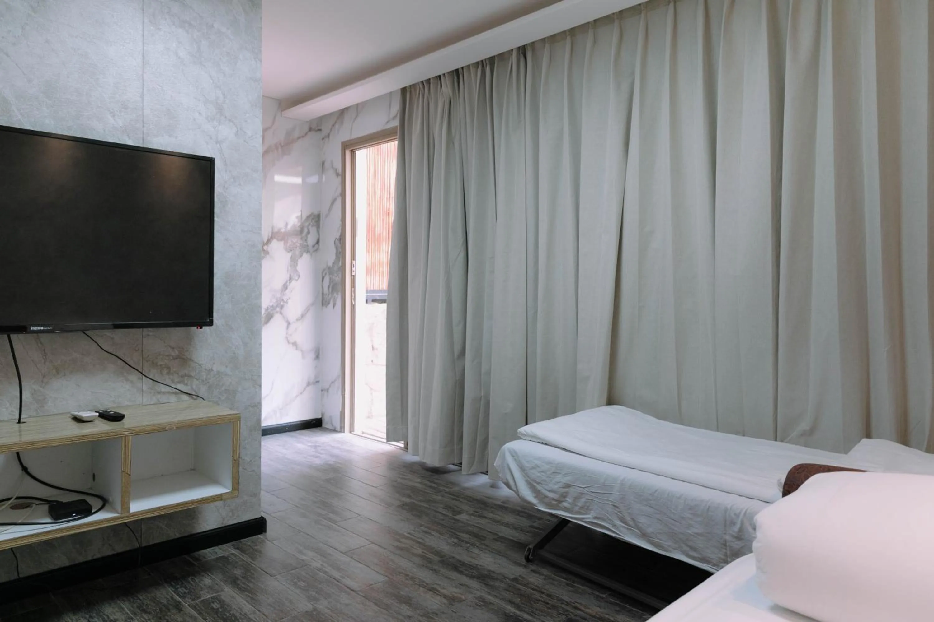 Bed in Rich Luxury Suites - Renovated