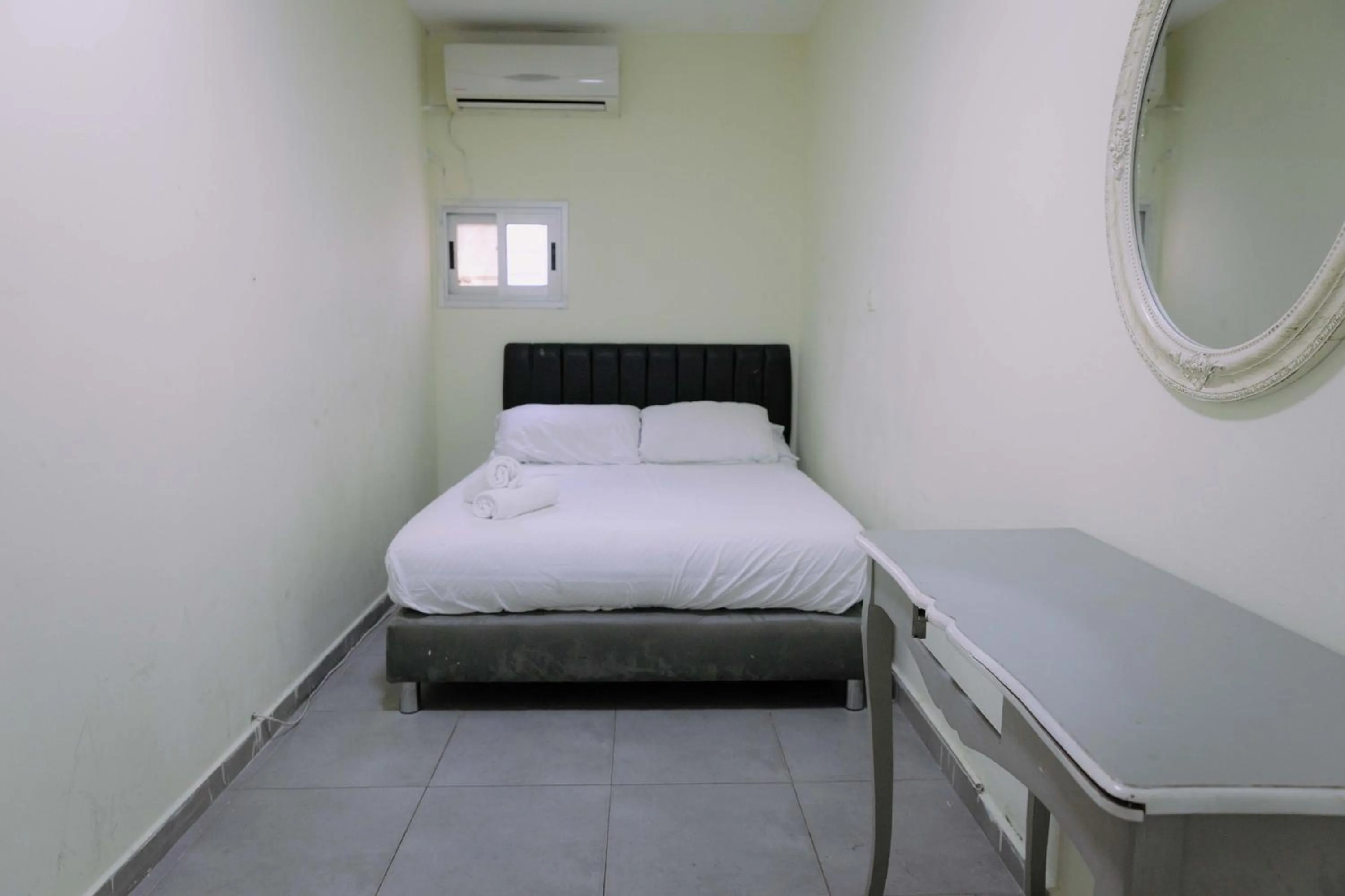 Bed in Rich Luxury Suites