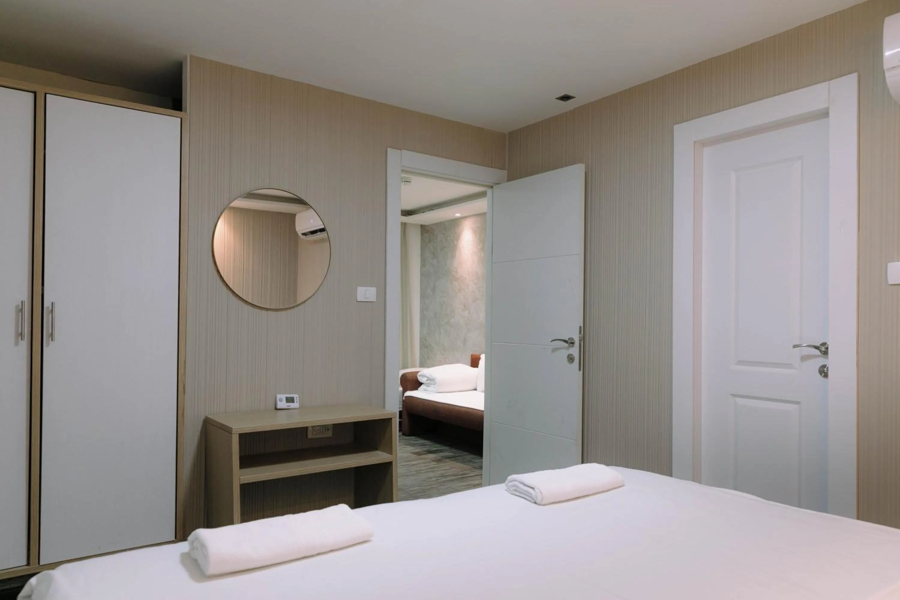 Bedroom, Bed in Rich Luxury Suites - Renovated