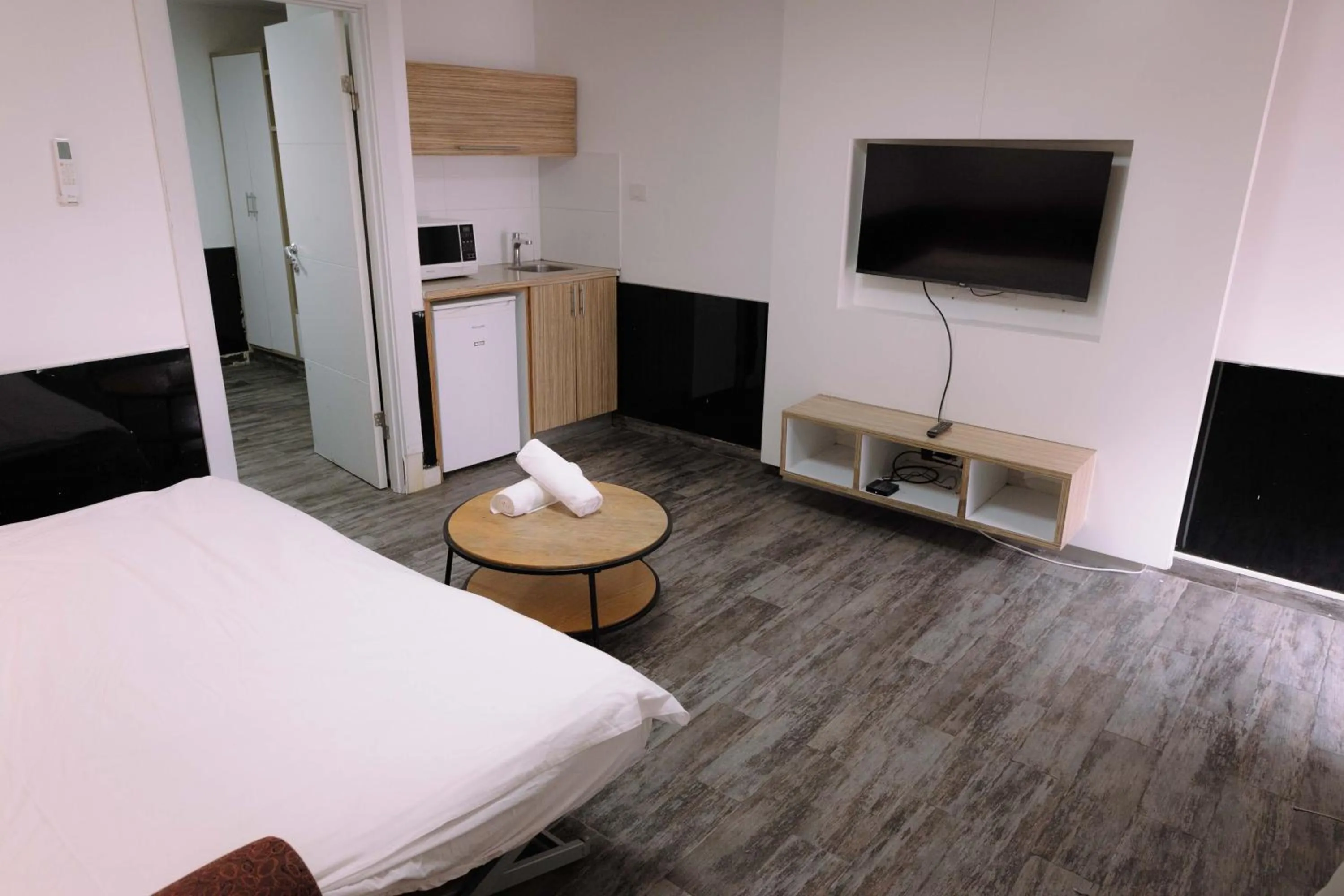 Bed in Rich Luxury Suites