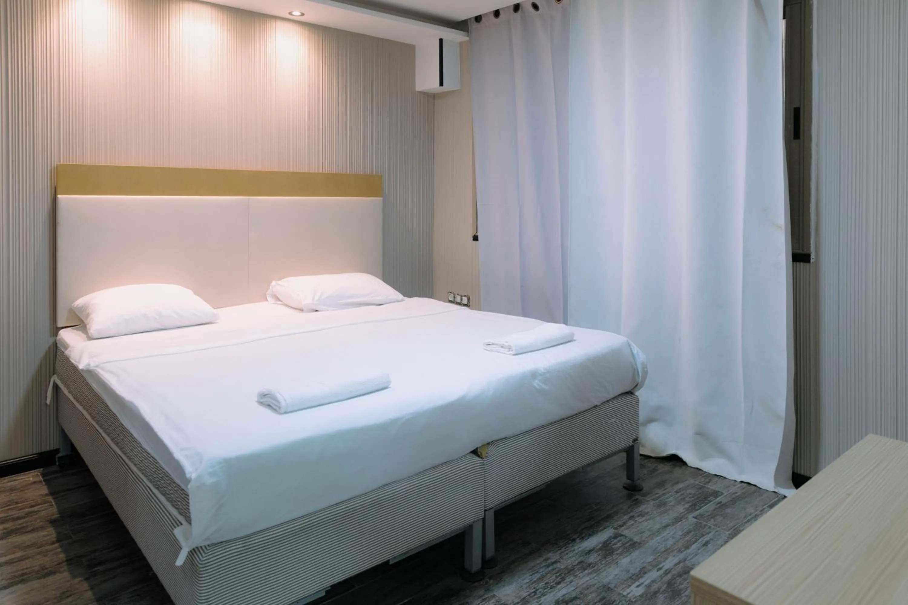 Bedroom, Bed in Rich Luxury Suites - Renovated