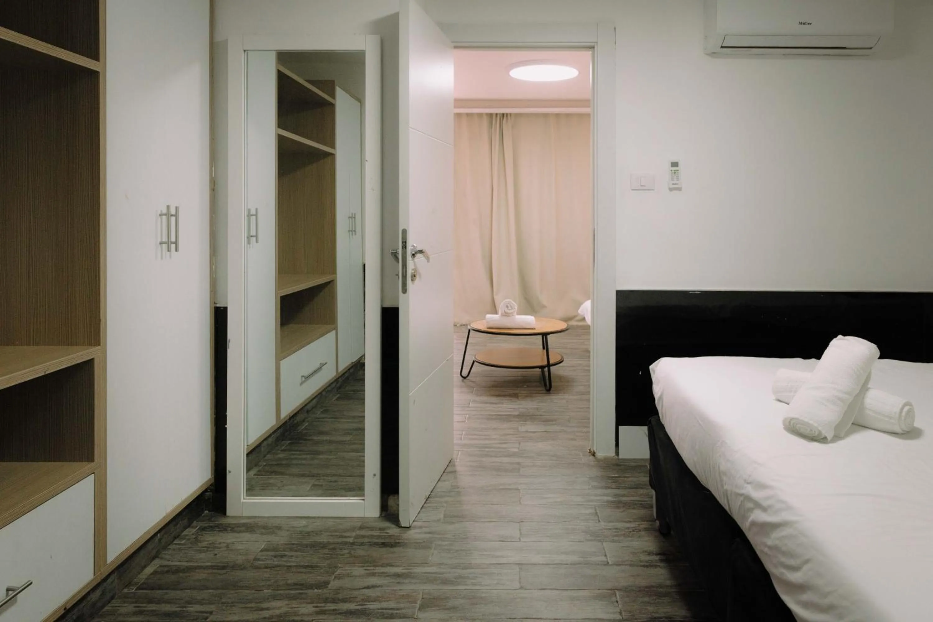 Bed in Rich Luxury Suites