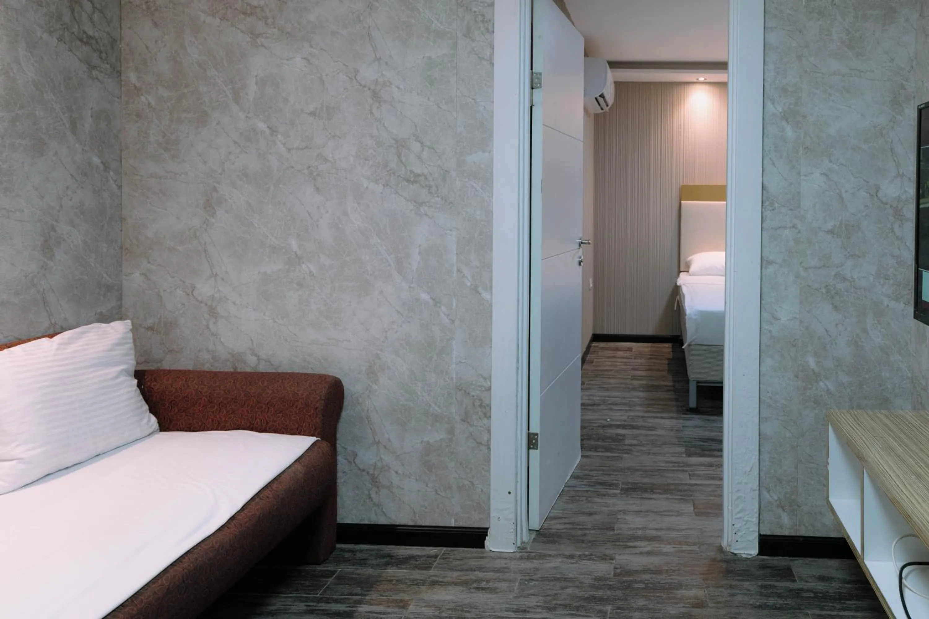 Living room, Bed in Rich Luxury Suites - Renovated