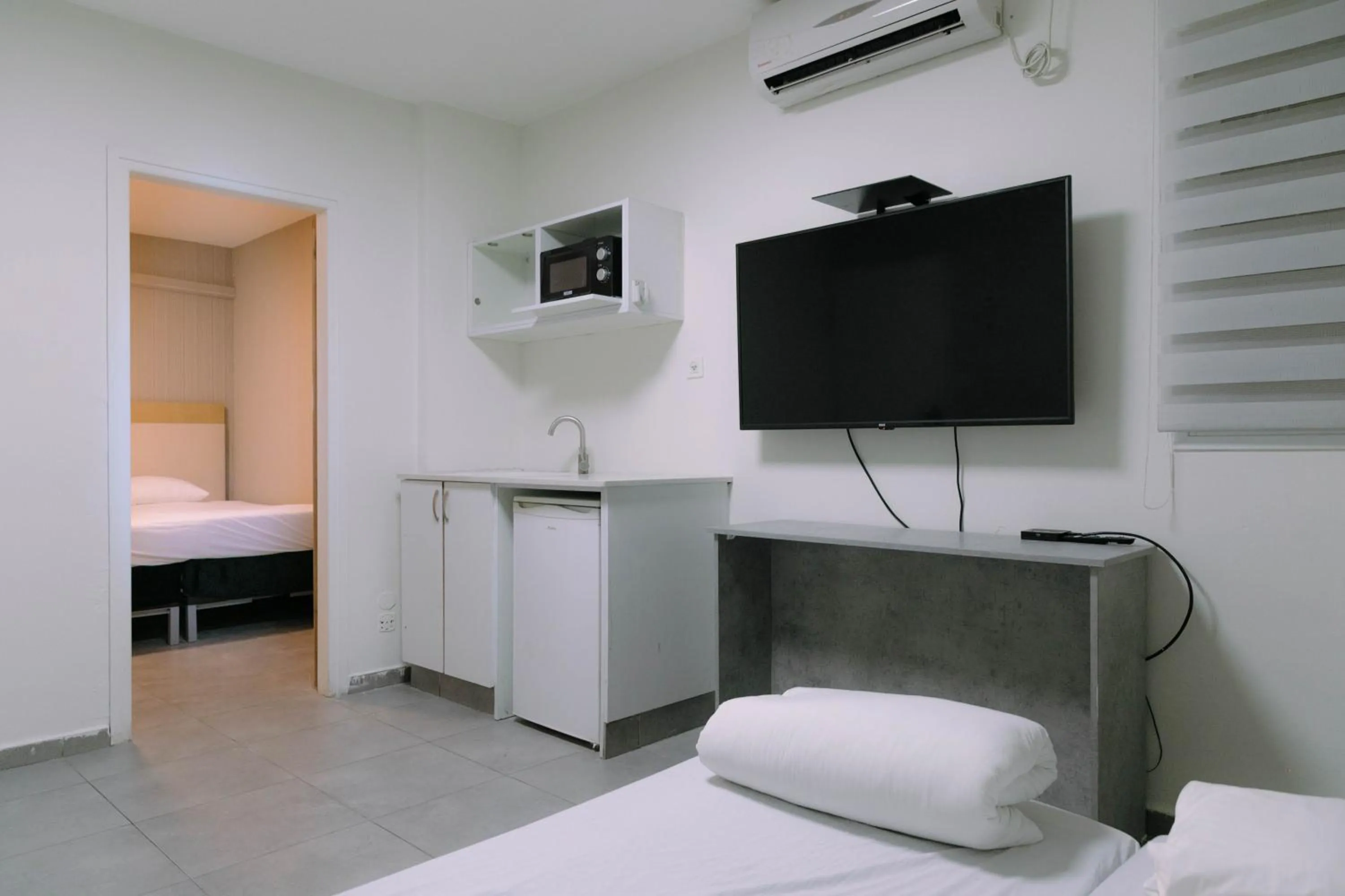 Bed in Rich Luxury Suites - Renovated