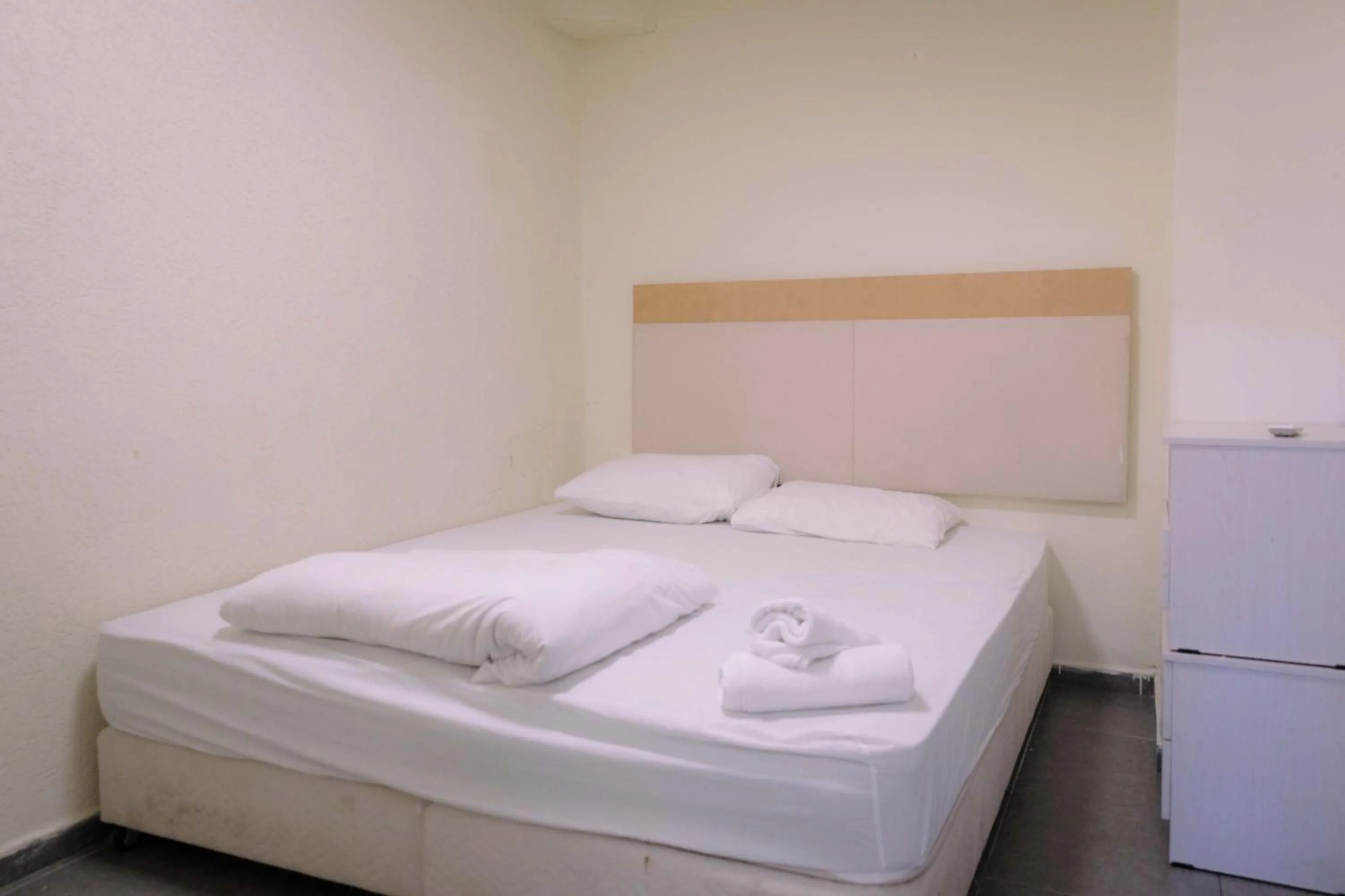 Bed in Rich Luxury Suites