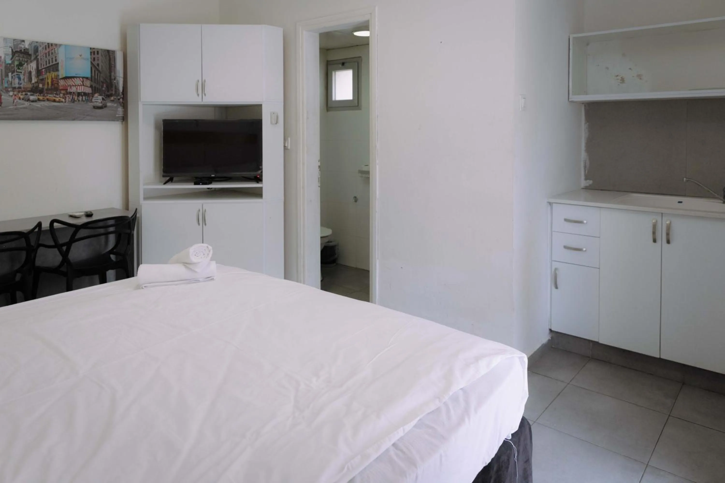 Bed in Rich Luxury Suites