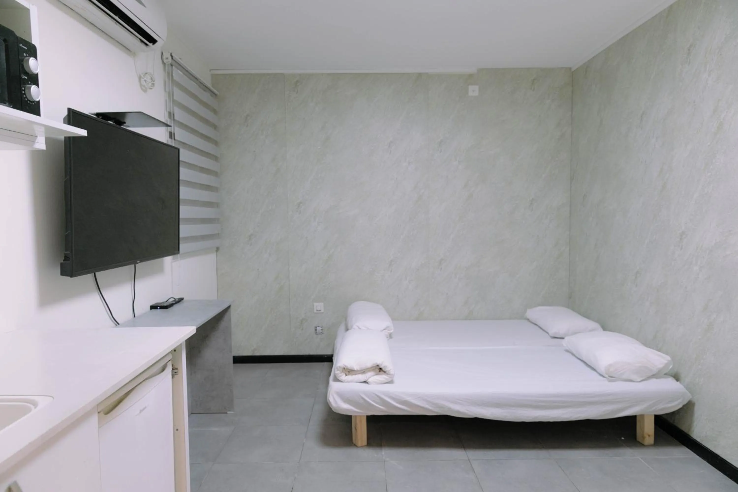 Bed in Rich Luxury Suites - Renovated