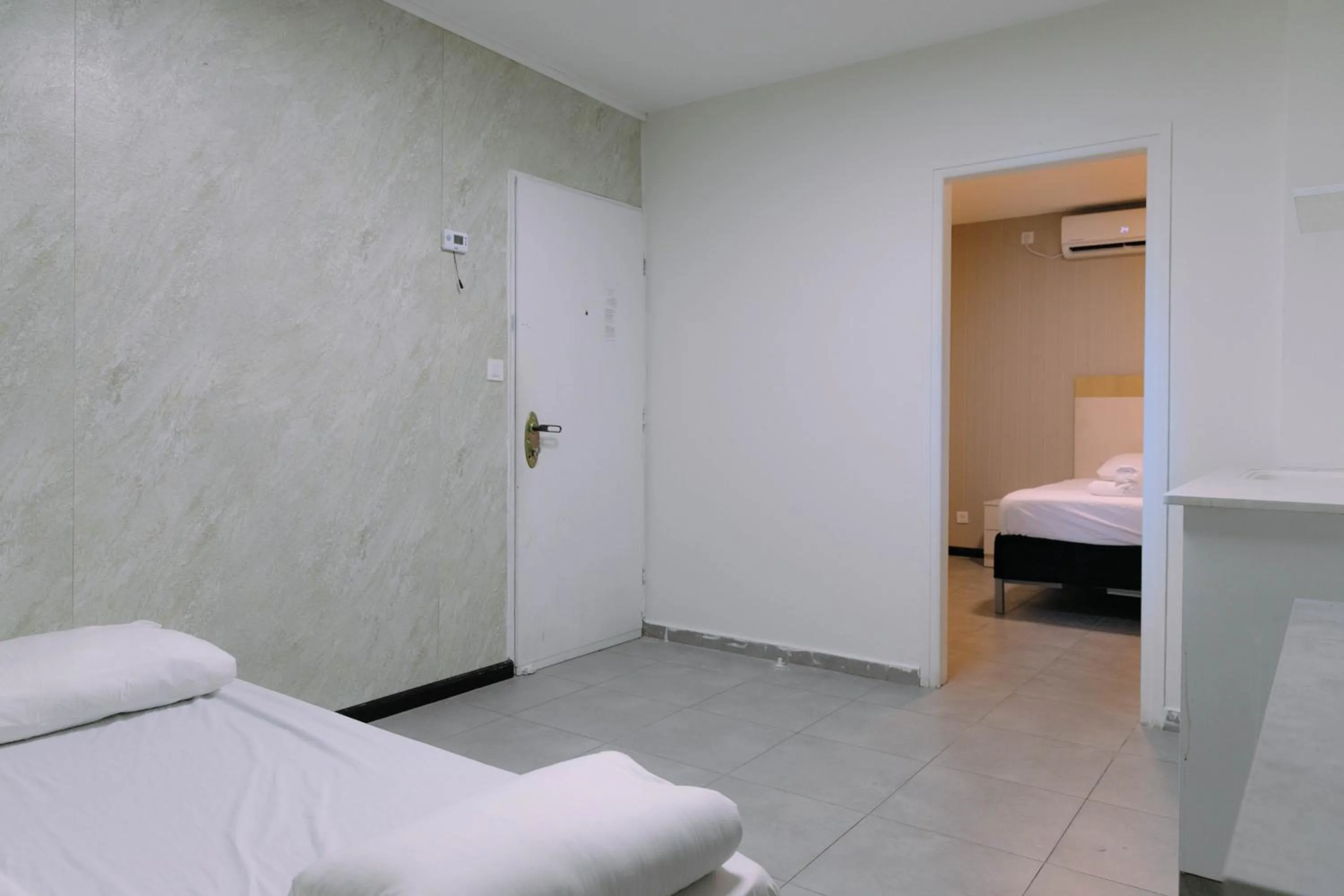 Bed in Rich Luxury Suites - Renovated