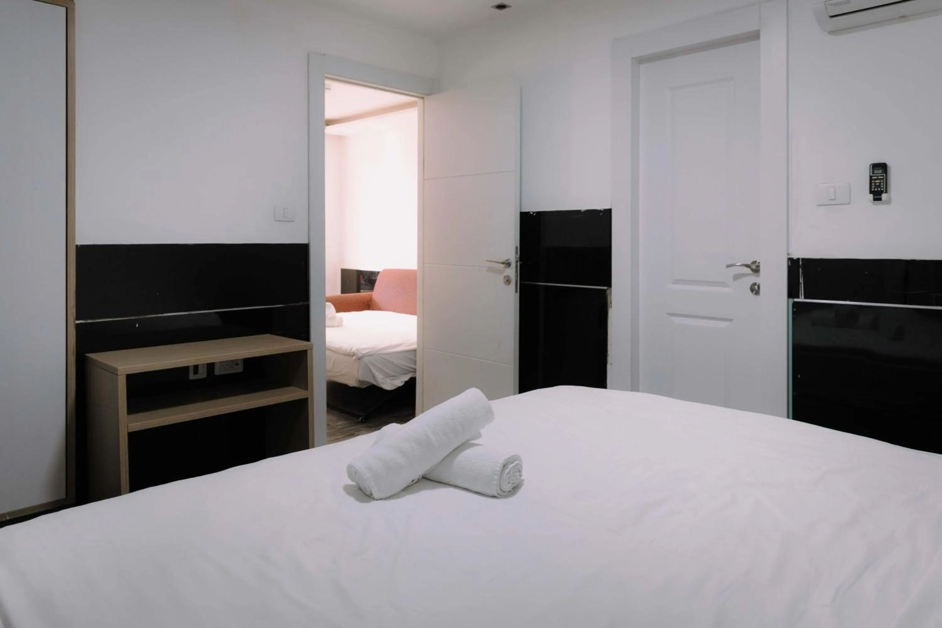 Bed in Rich Luxury Suites