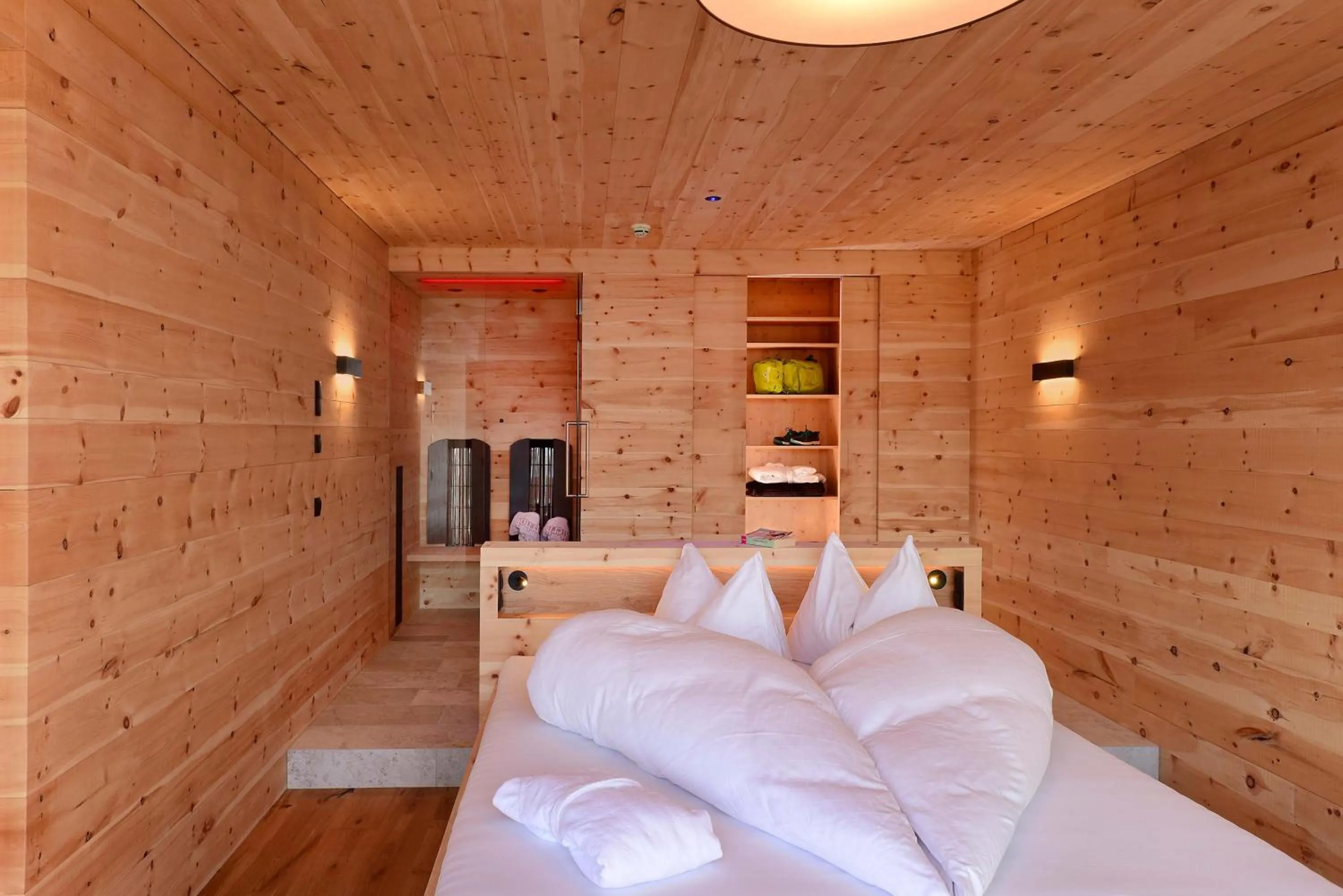 Bed in Tratterhof Mountain Sky Hotel