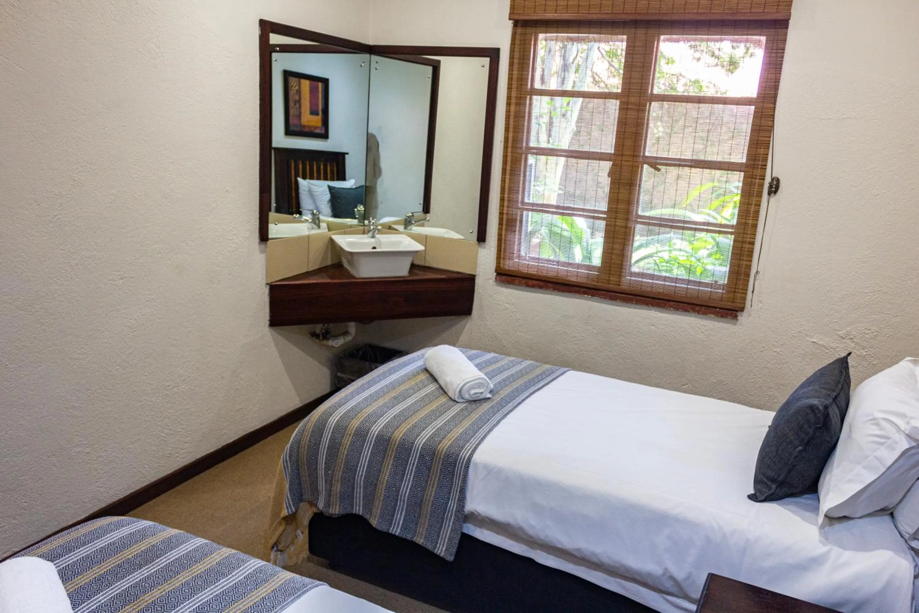 Bedroom, Bed in Hotel Numbi & Garden Suites