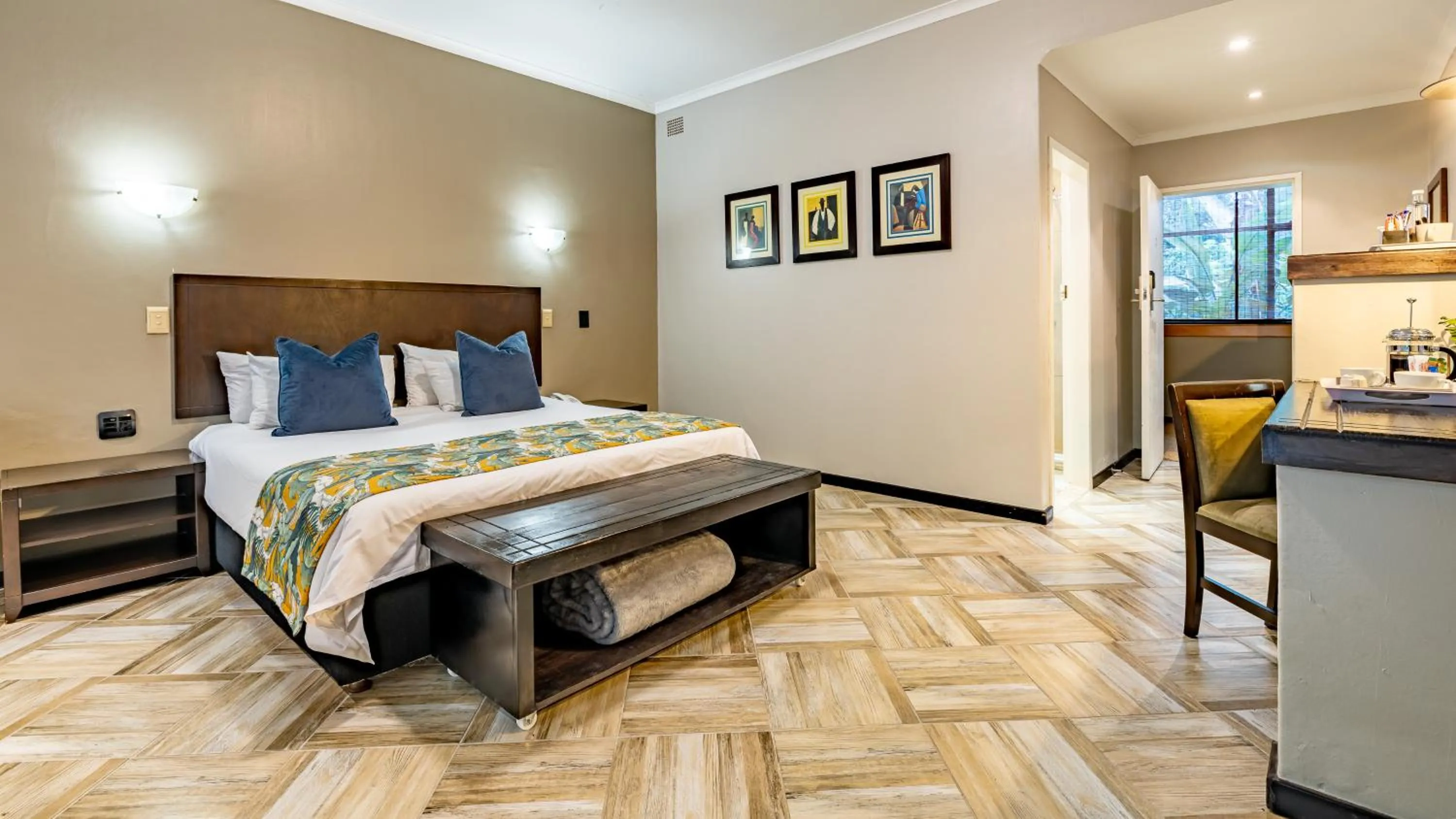 Bed in Hotel Numbi & Garden Suites