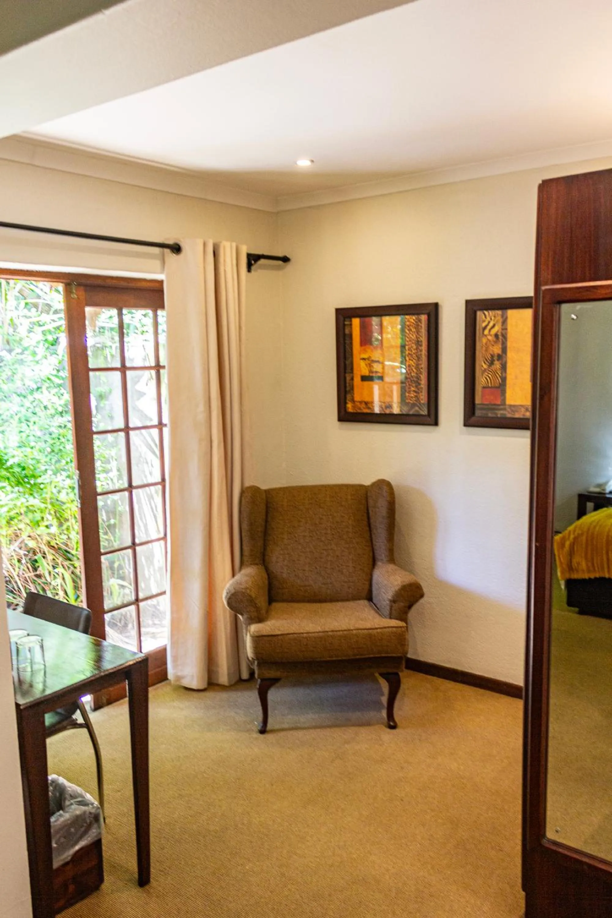 Seating area in Hotel Numbi & Garden Suites