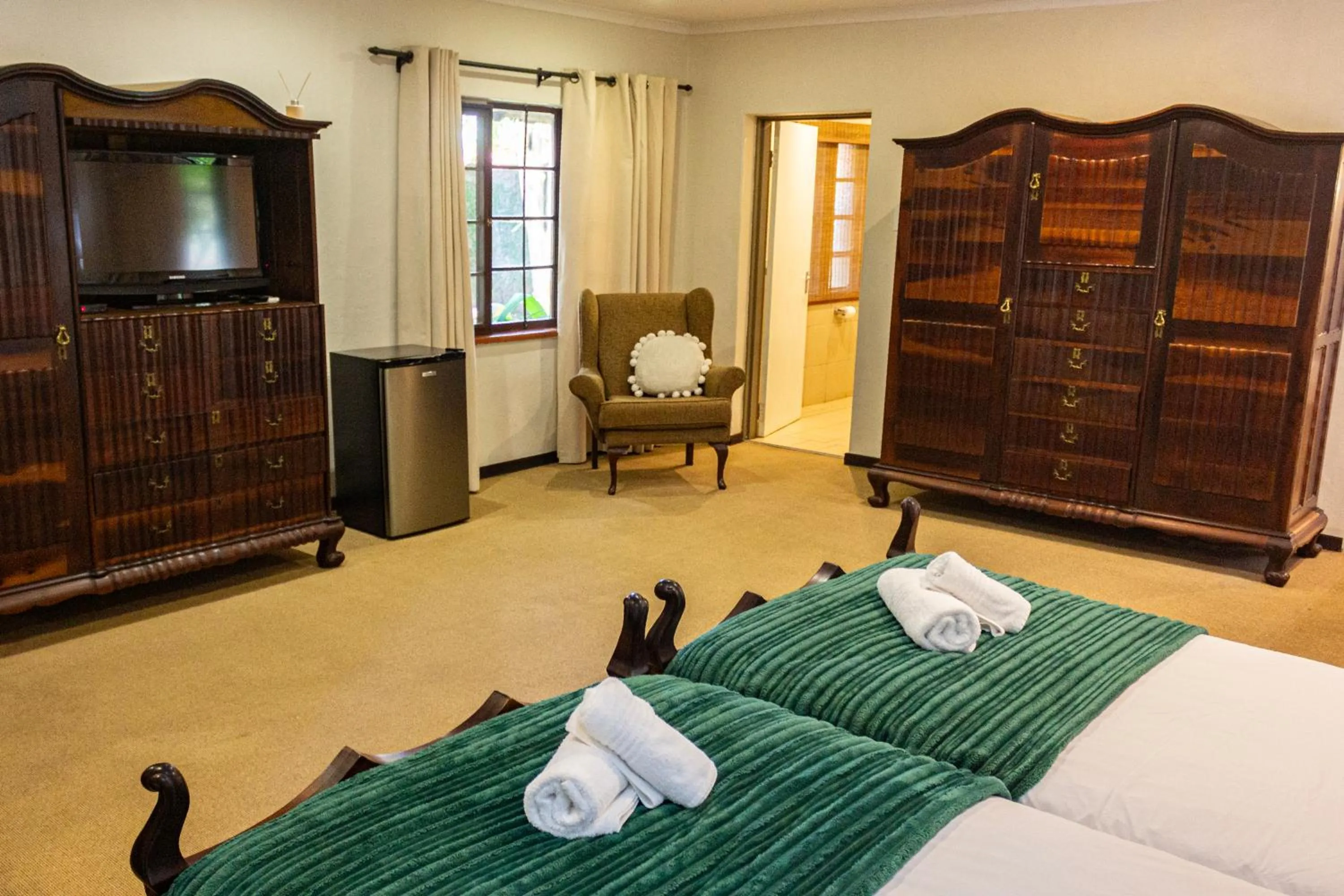 Bedroom, Bed in Hotel Numbi & Garden Suites