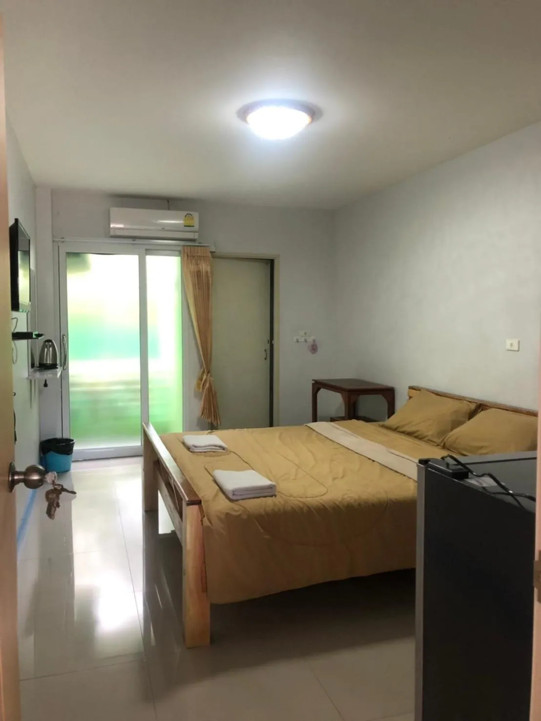 Bed in S Diamond Apartment