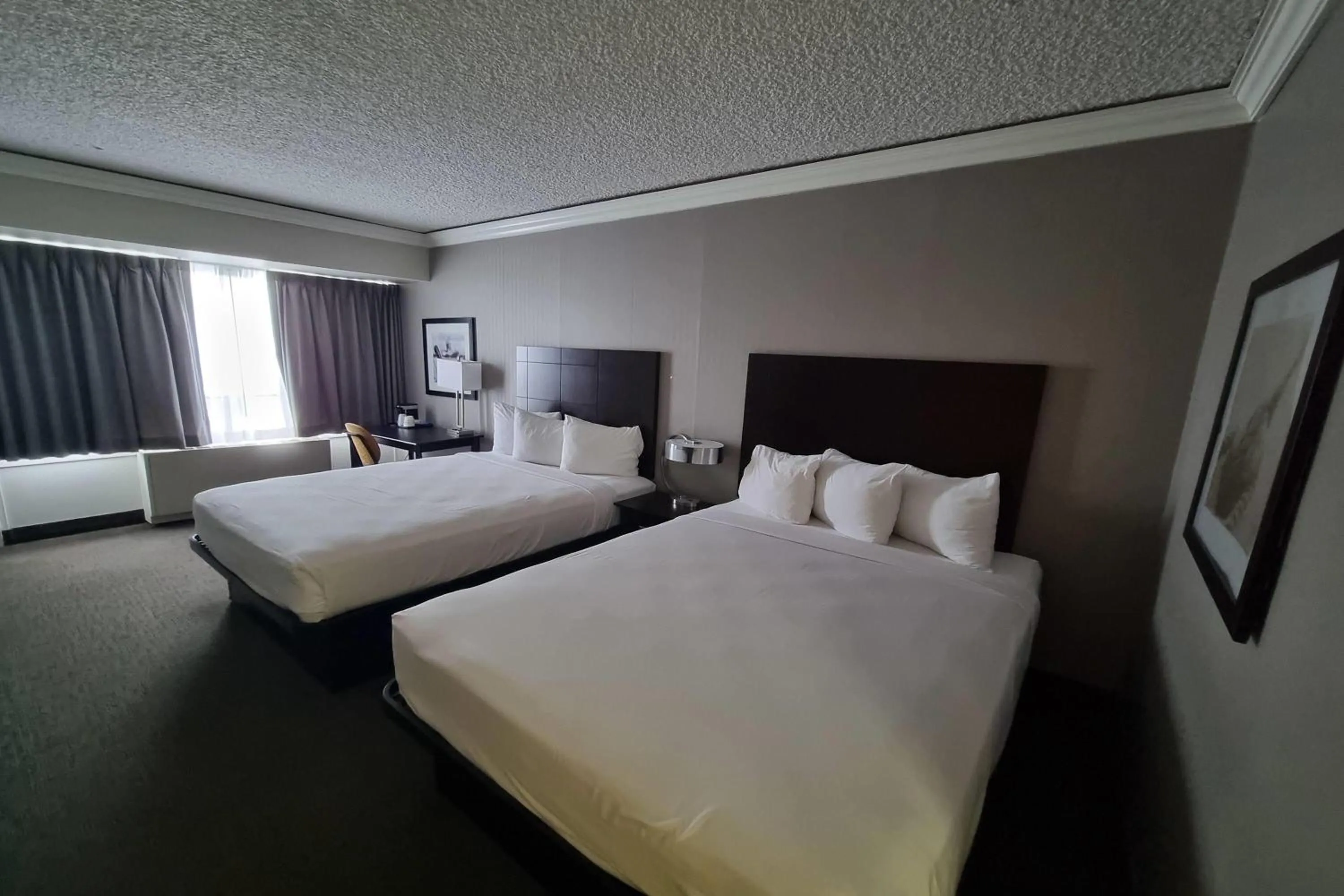 Photo of the whole room, Bed in Travelodge by Wyndham Trois-Rivieres