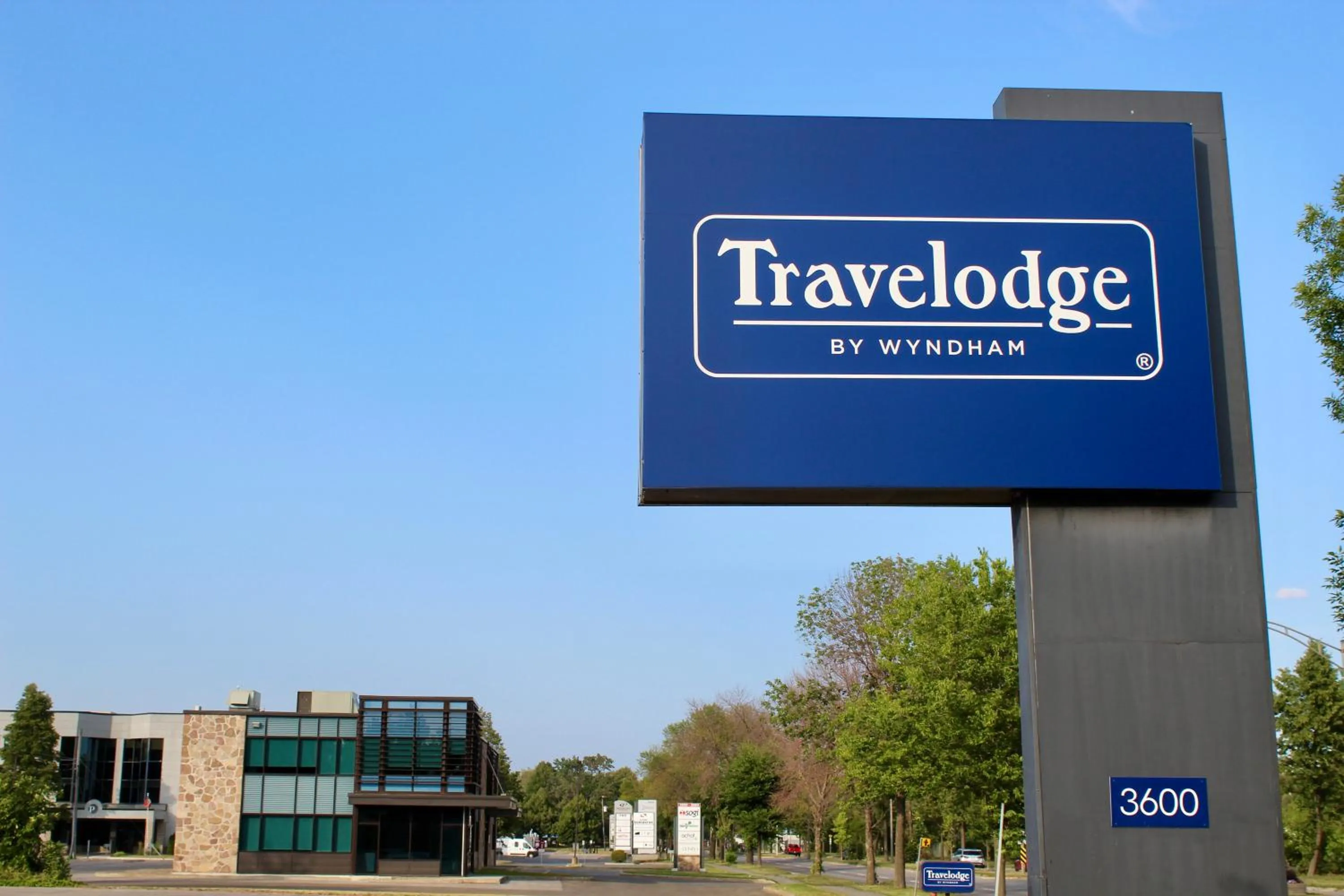 Property logo or sign in Travelodge by Wyndham Trois-Rivieres