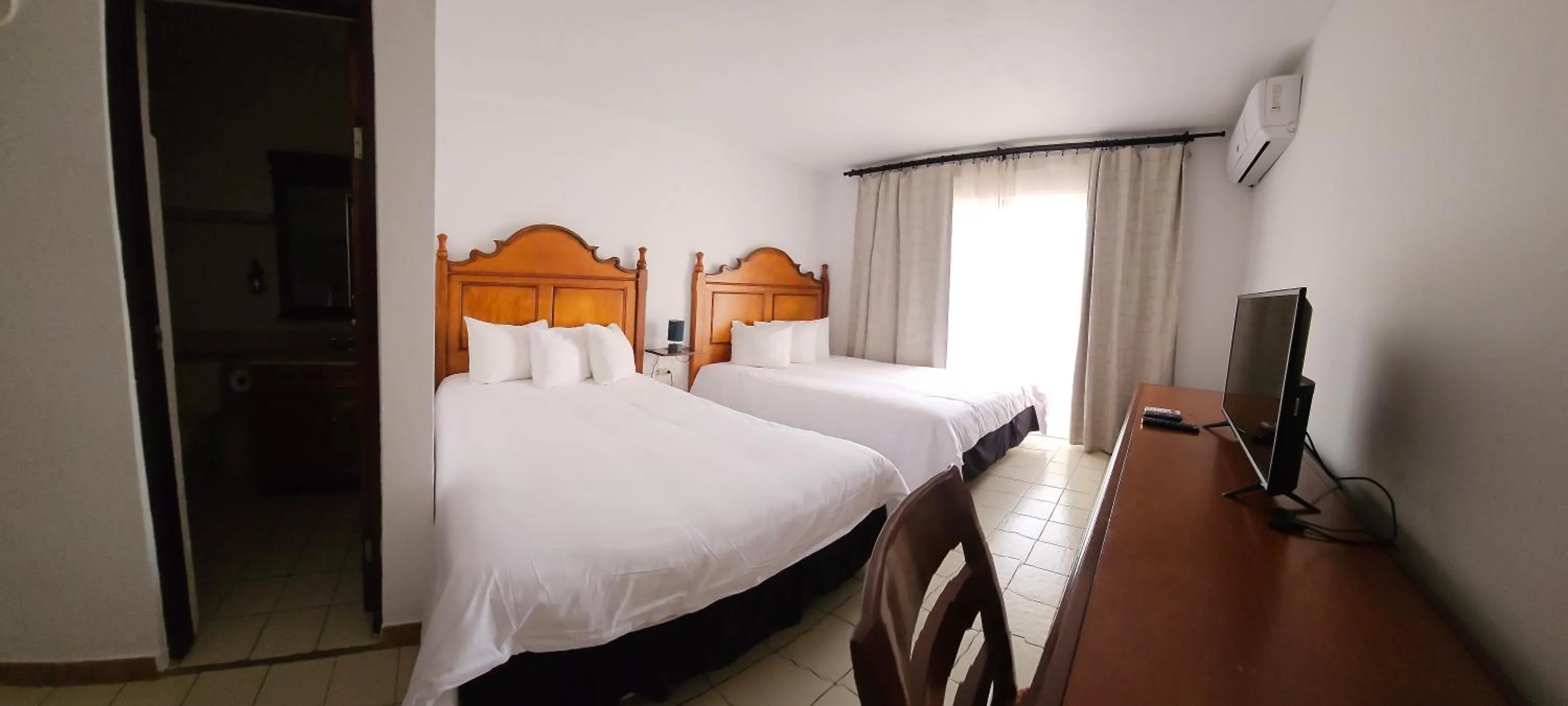 Bed in Selva Boutique Hotel - Luquillo Oceanfront Retreat - Adults Only