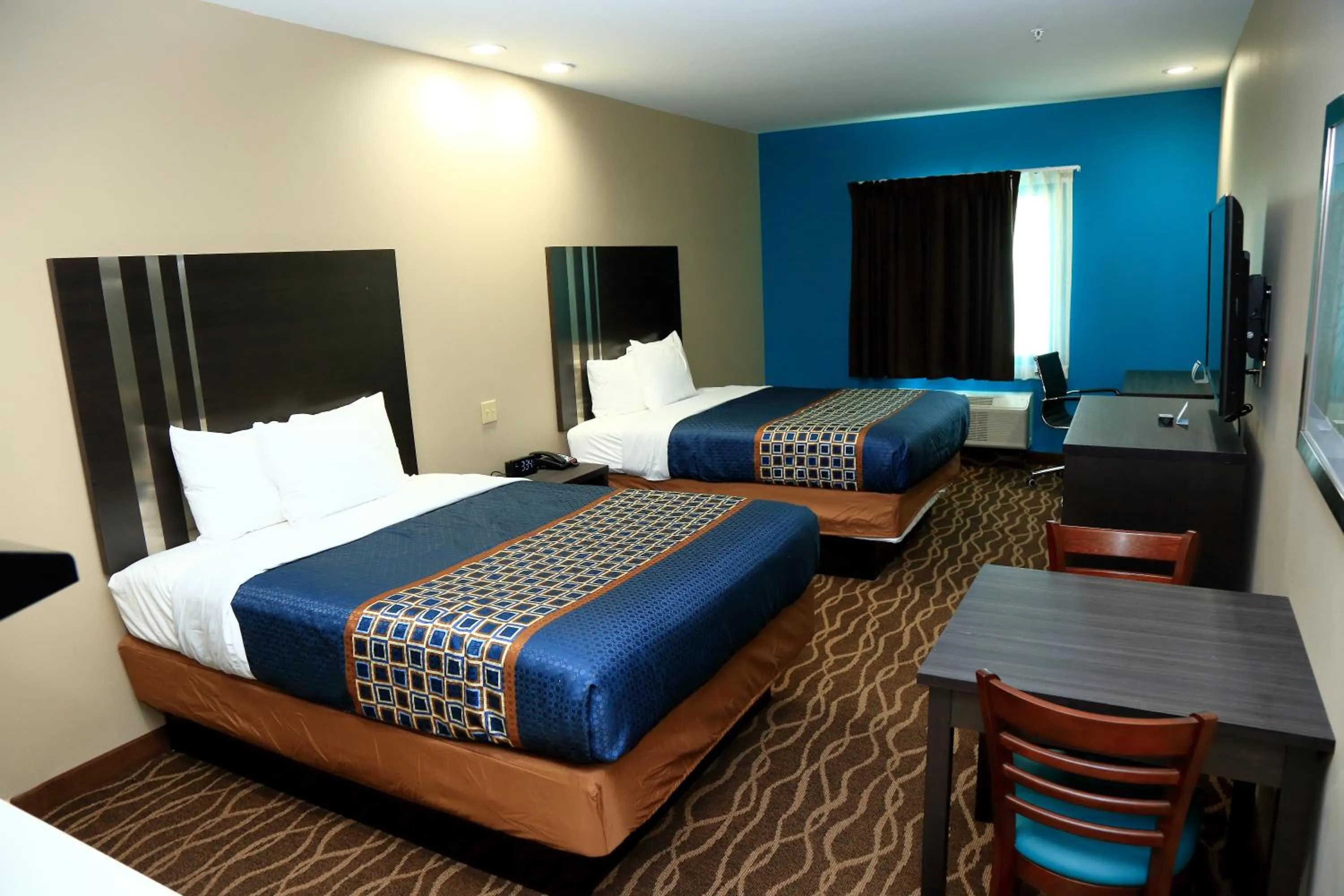 Bed in Americas Best Value Inn & Suites-Prairieville