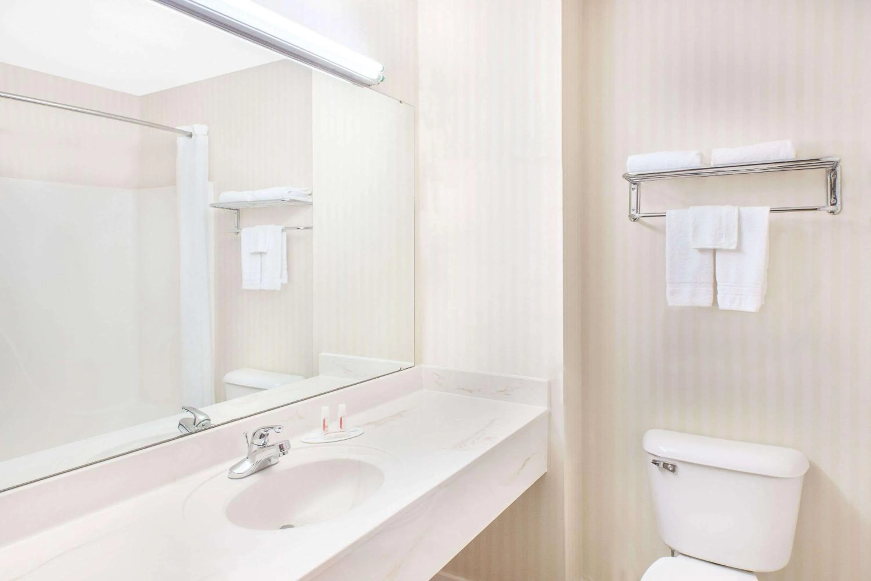 Bathroom in Super 8 by Wyndham Lowell/Bentonville/Rogers Area