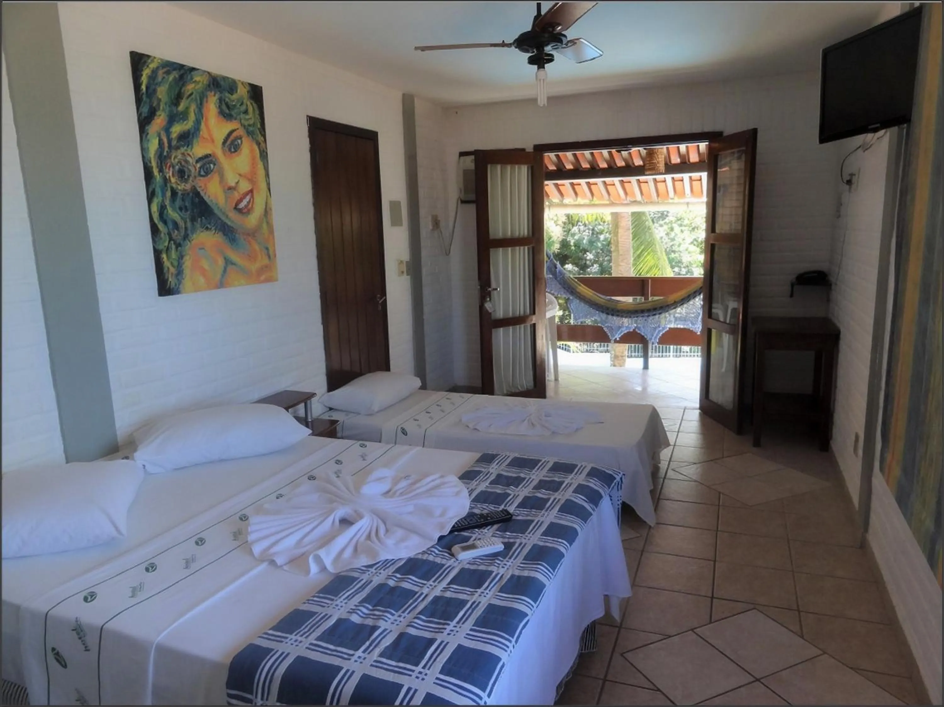 Bed in Hotel Tubarão