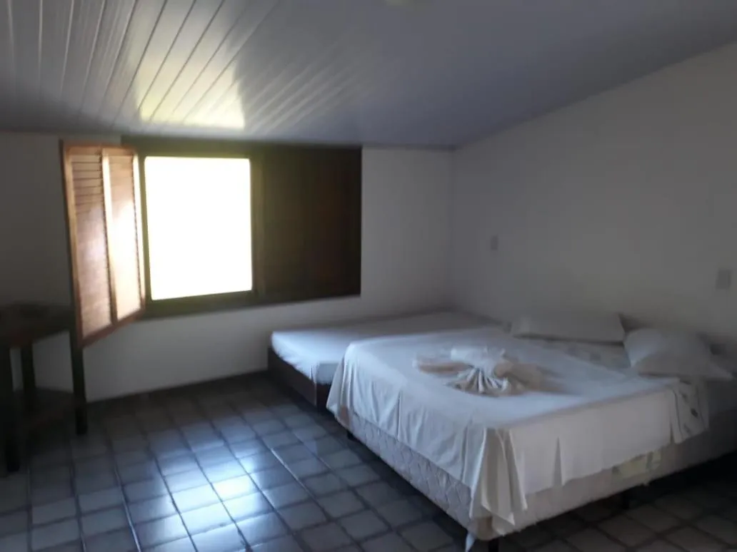 Bed in Hotel Tubarão