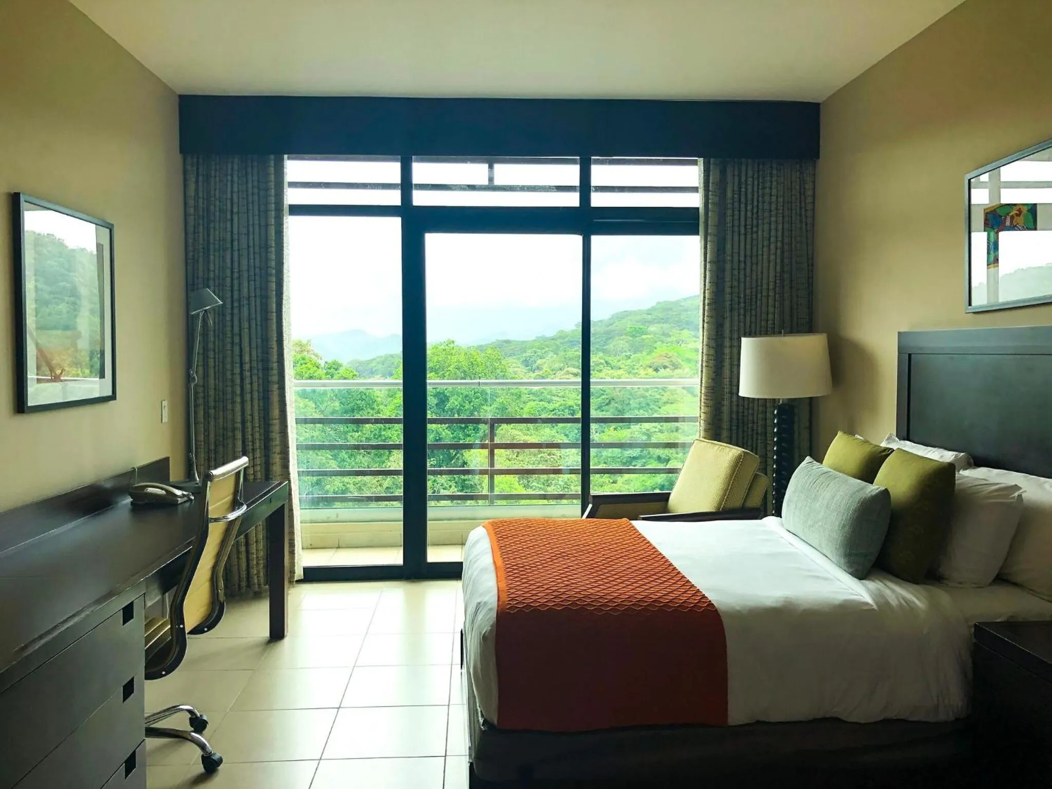 Bed in Summit Rainforest Golf Resort & All Inclusive